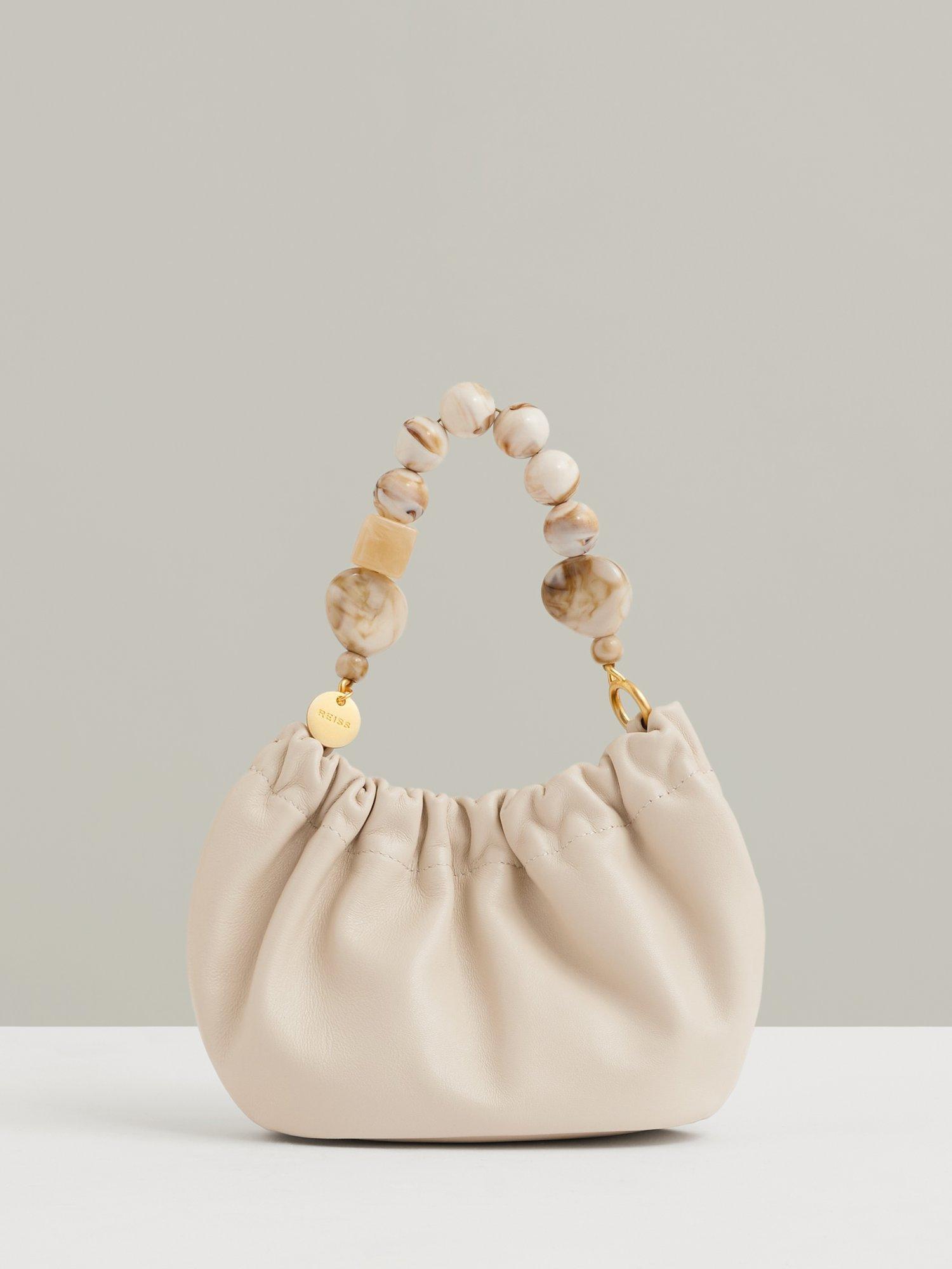 Product image 1 of 5, which shows Reiss Erin Leather Bead Handle Bag, Off White