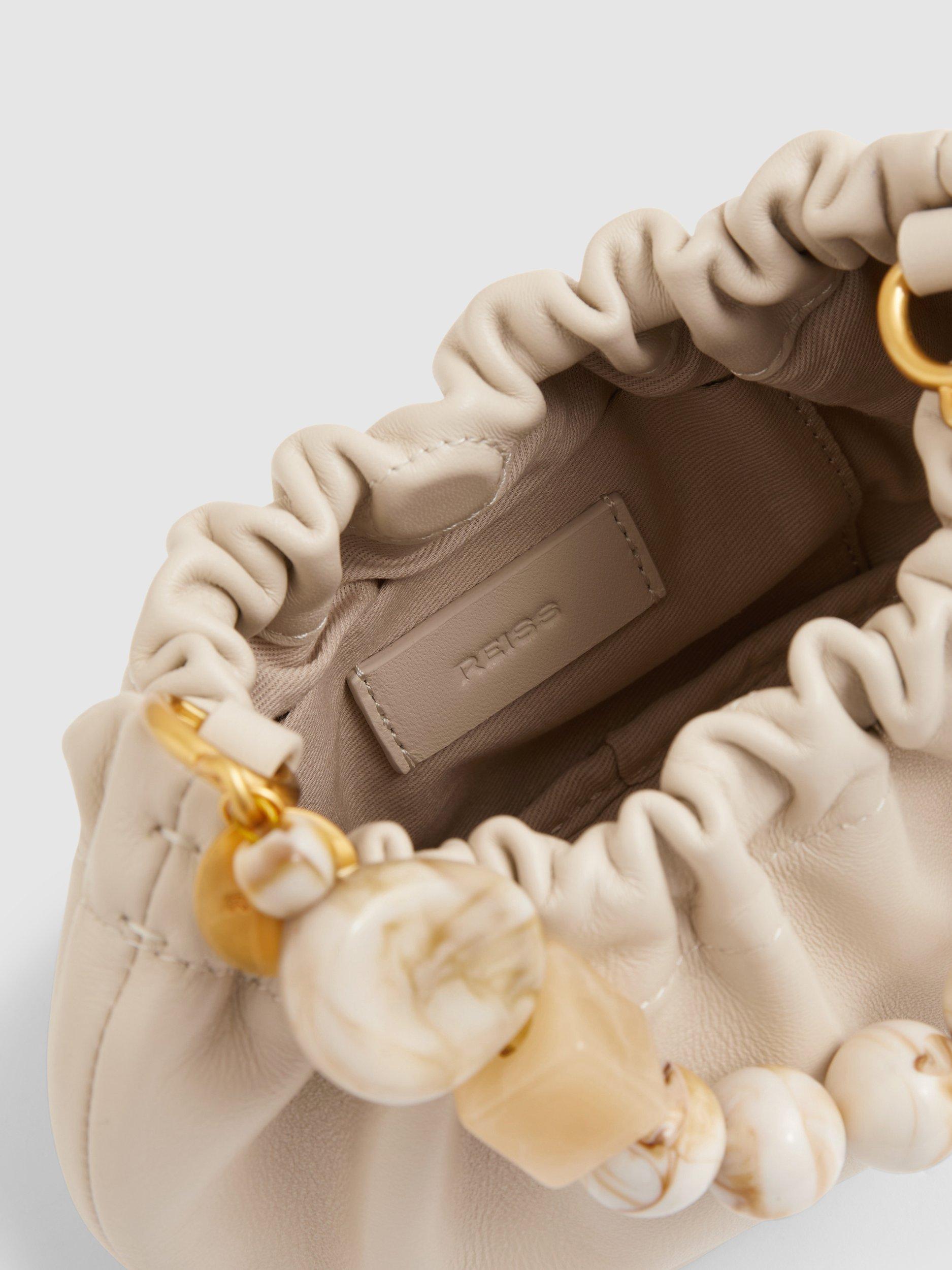 Product image 4 of 5, which shows Reiss Erin Leather Bead Handle Bag, Off White