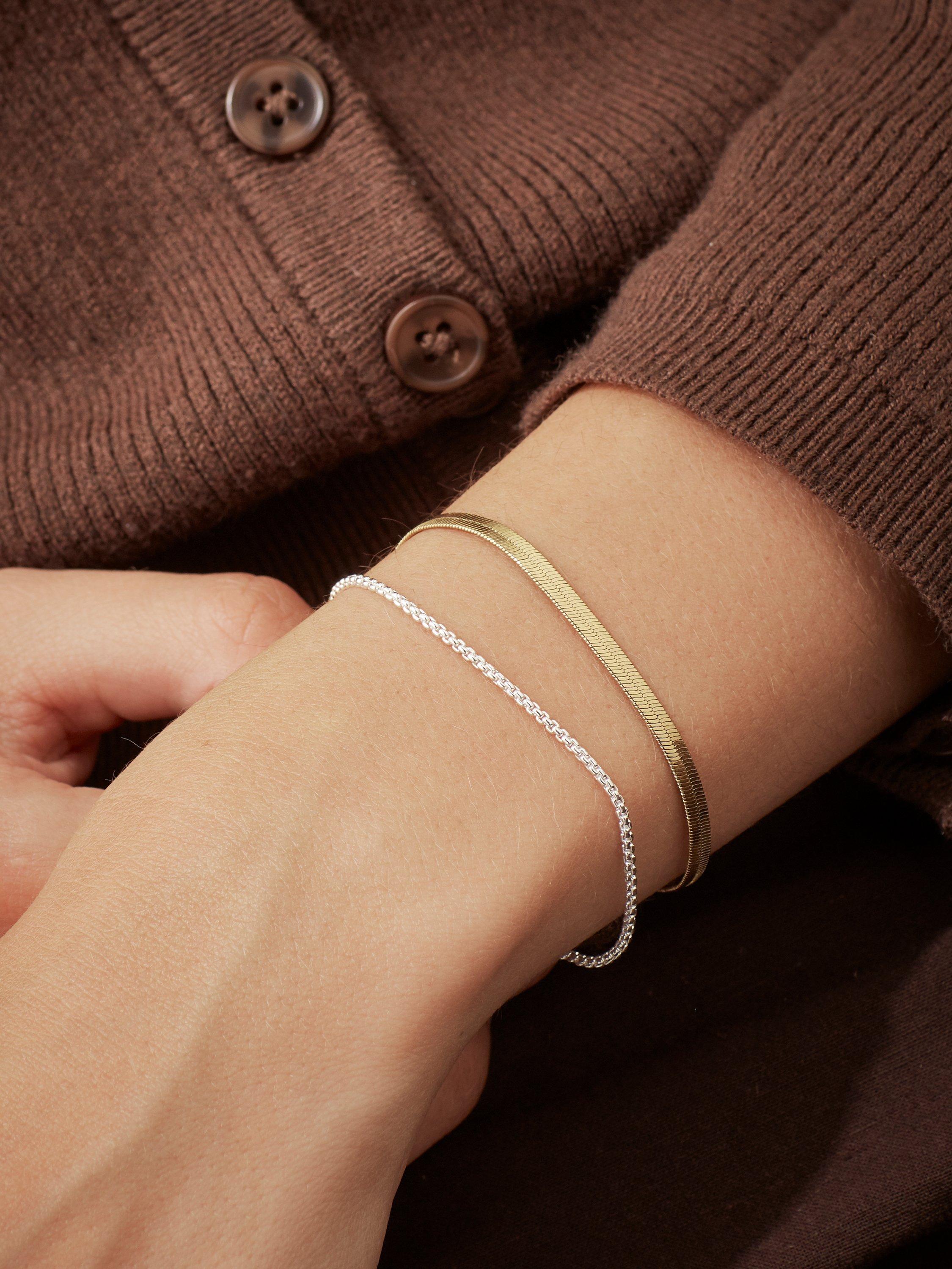 Product image 2 of 5, which shows Estella Bartlett Waterproof Multirow Herringbone Chain Bracelet, Silver/Gold