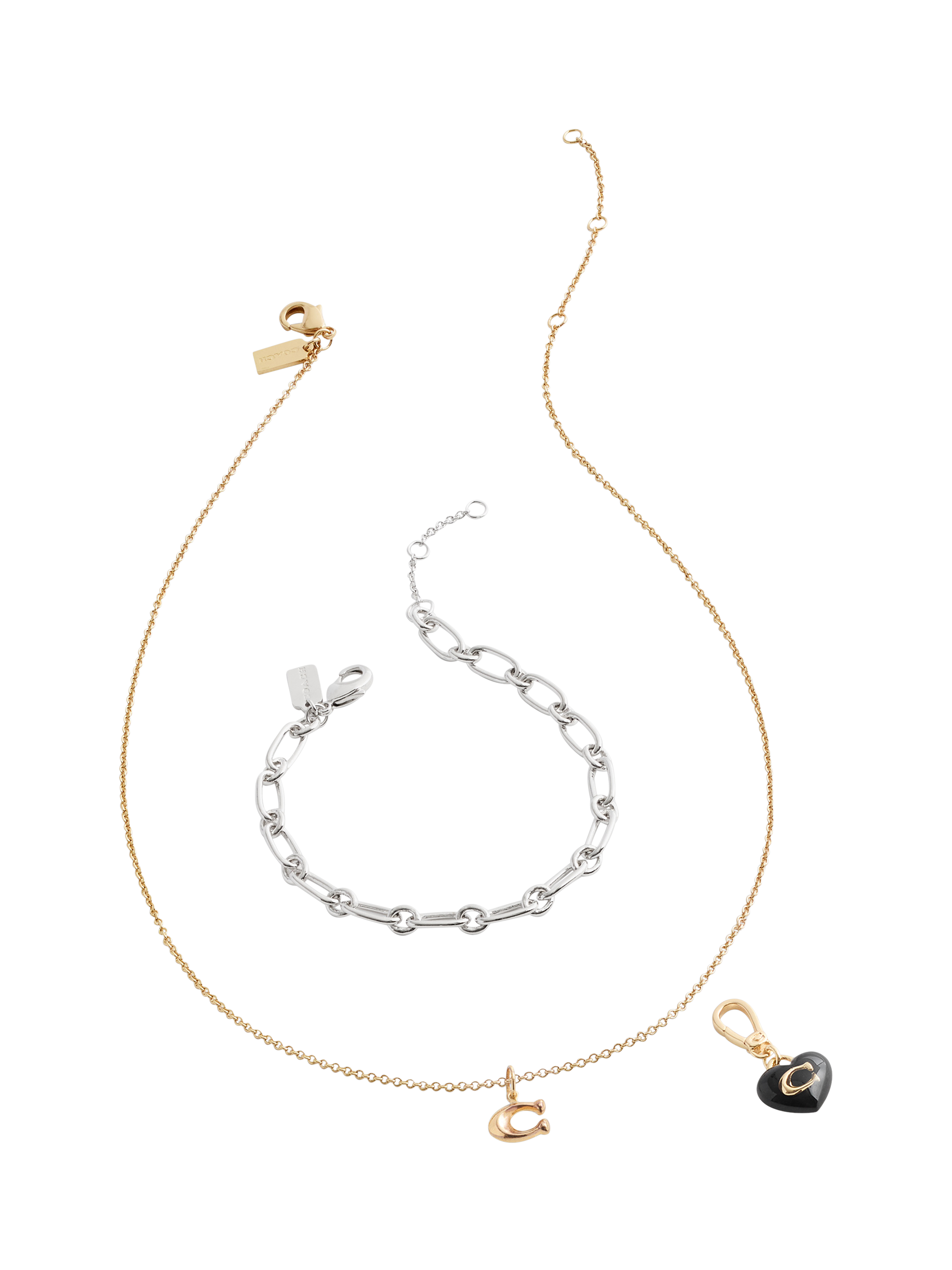 Product image 4 of 7, which shows Coach Signature C Heart Charm, Gold