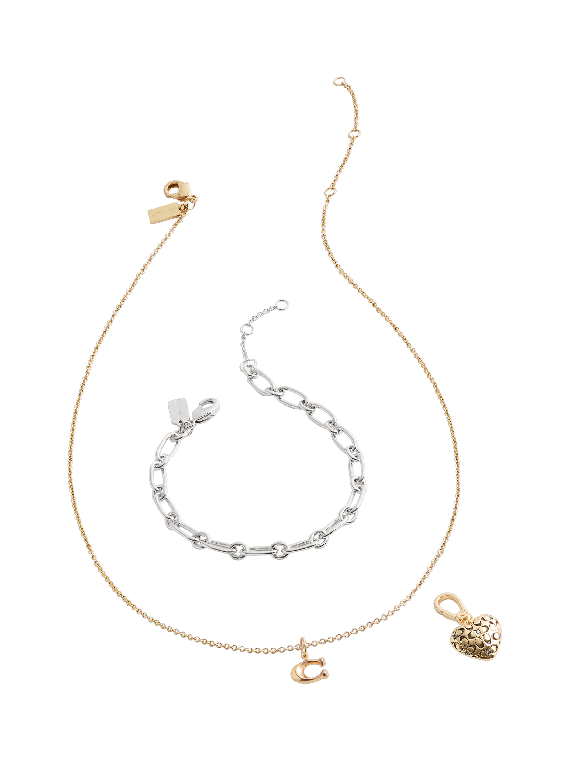 Product image 4 of 7, which shows Coach Signature C Heart Charm, Gold
