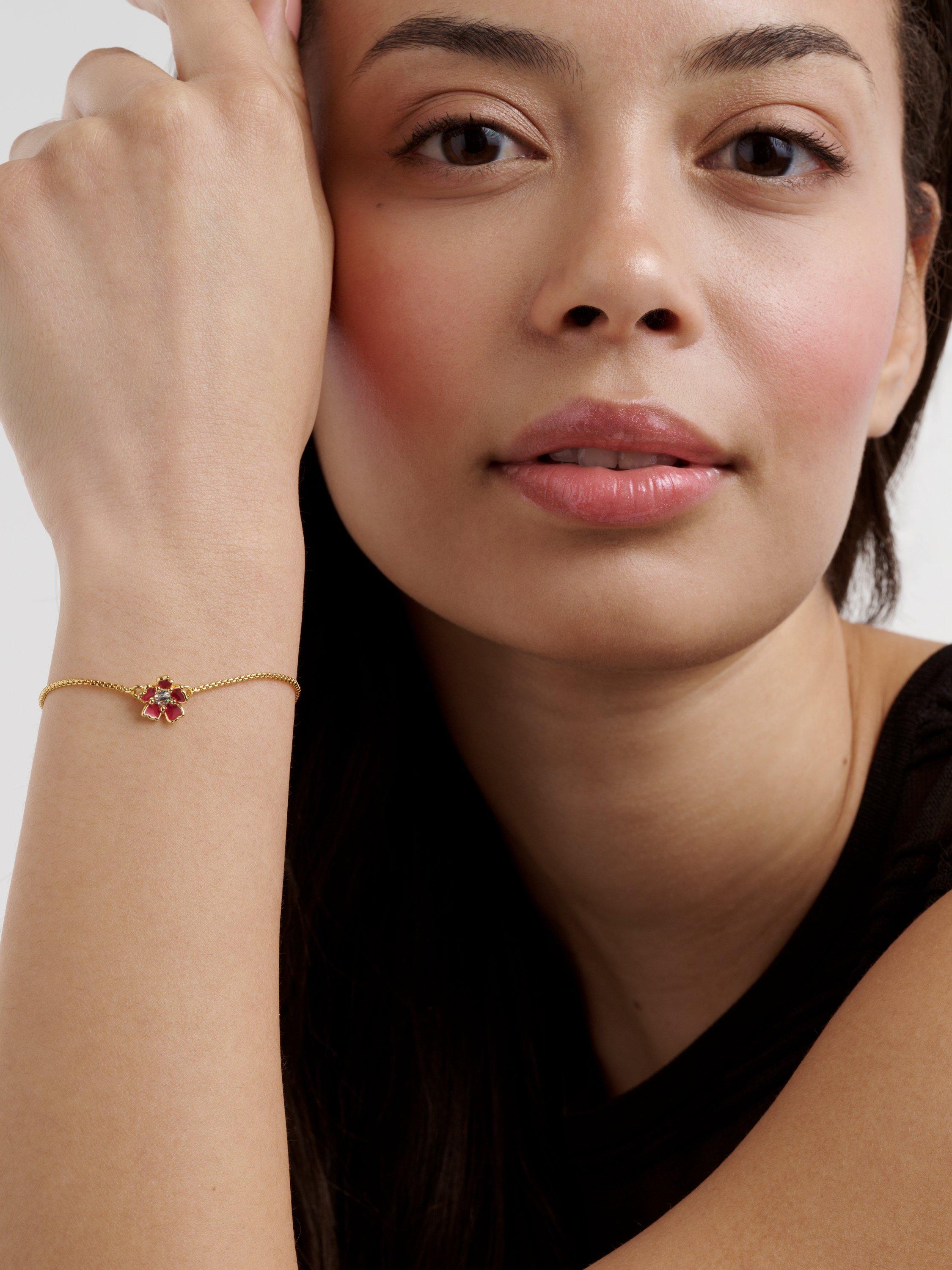 Product image 2 of 6, which shows Ted Baker Petial Painted Flower Adjustable Bracelet, Gold/Red