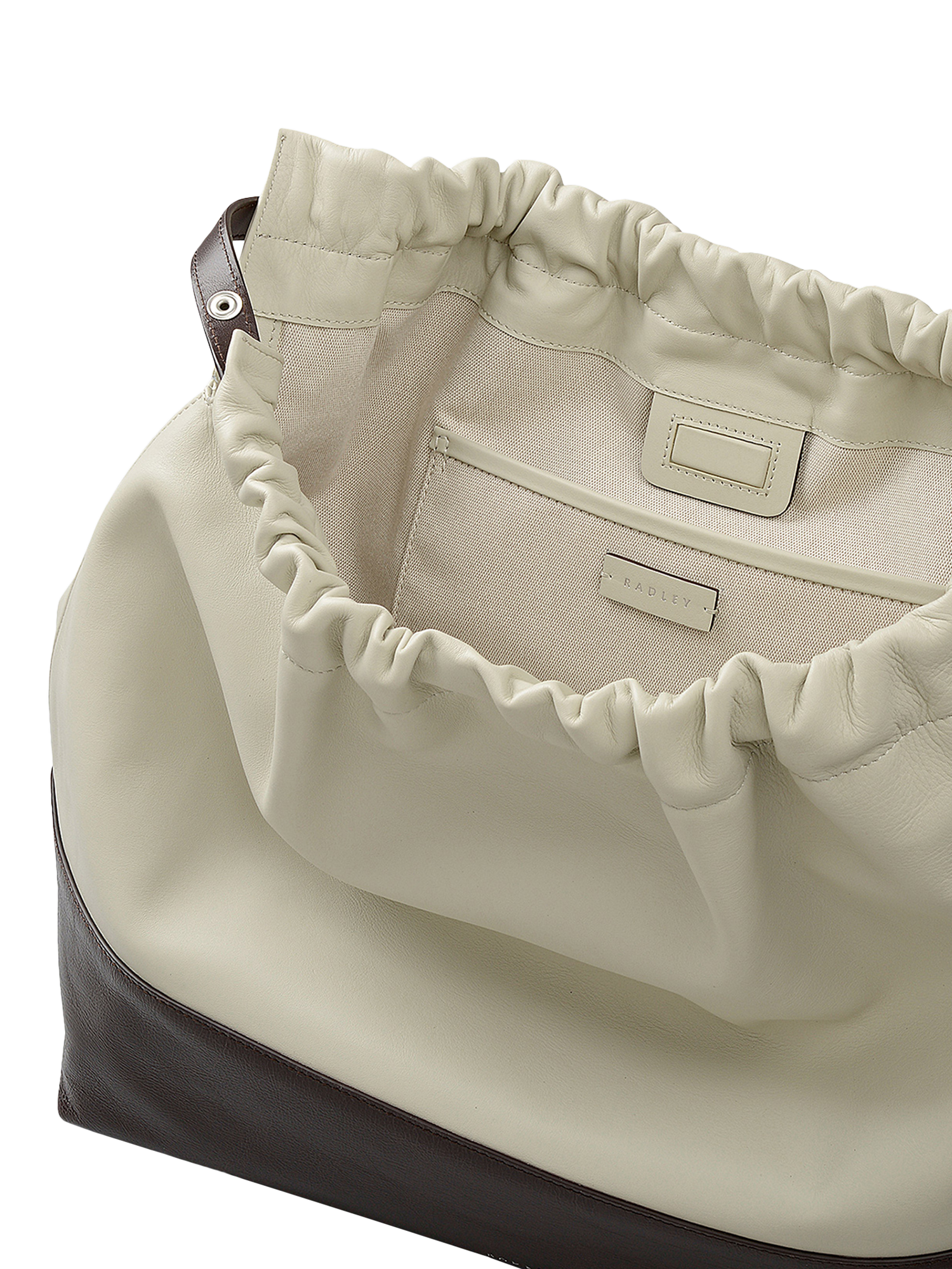 Product image 4 of 8, which shows Radley The Portobello Drawstring Shoulder Bag, White