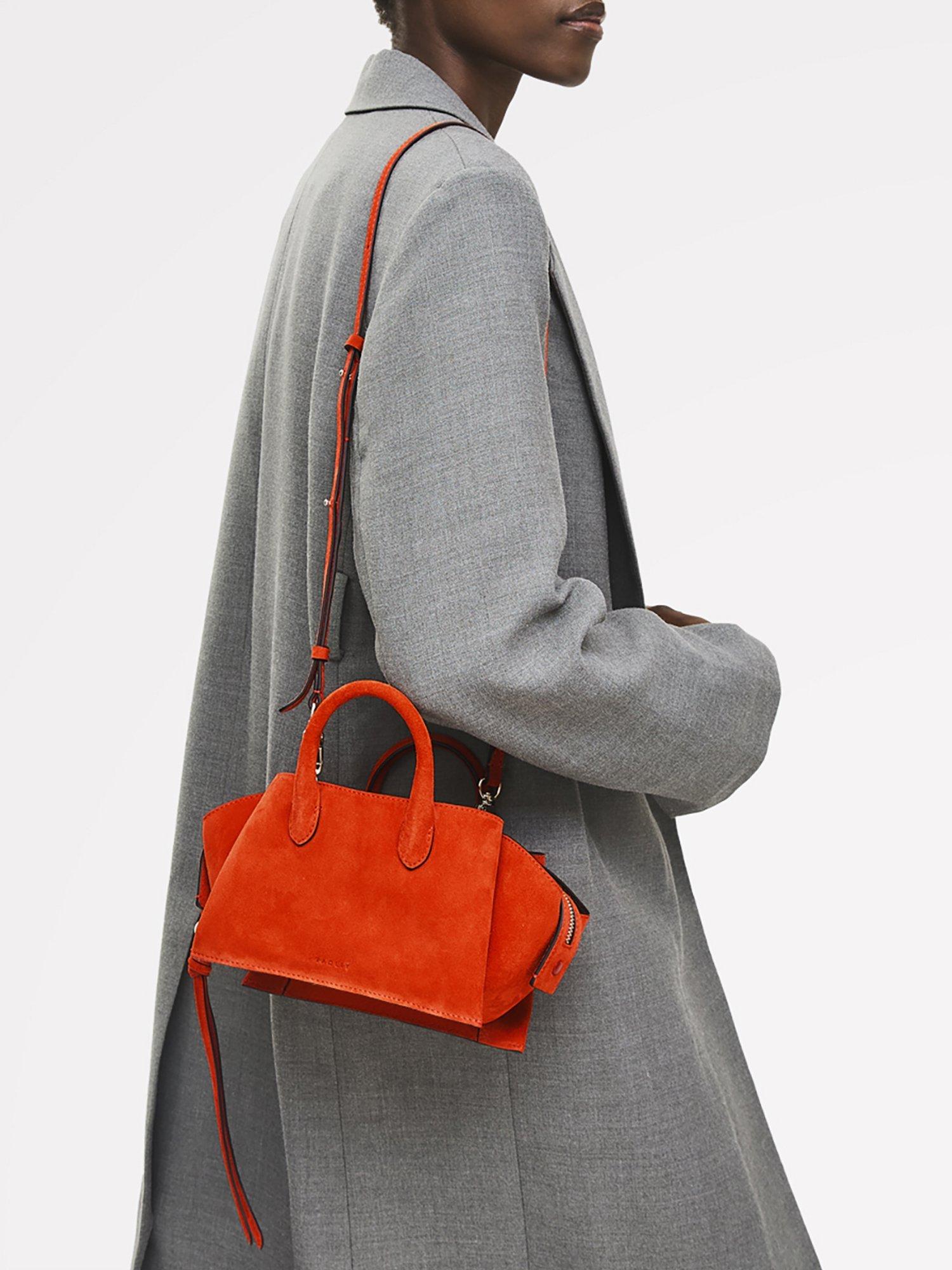 Product image 6 of 6, which shows Radley The Romilly Suede Small Grab Bag, Flame