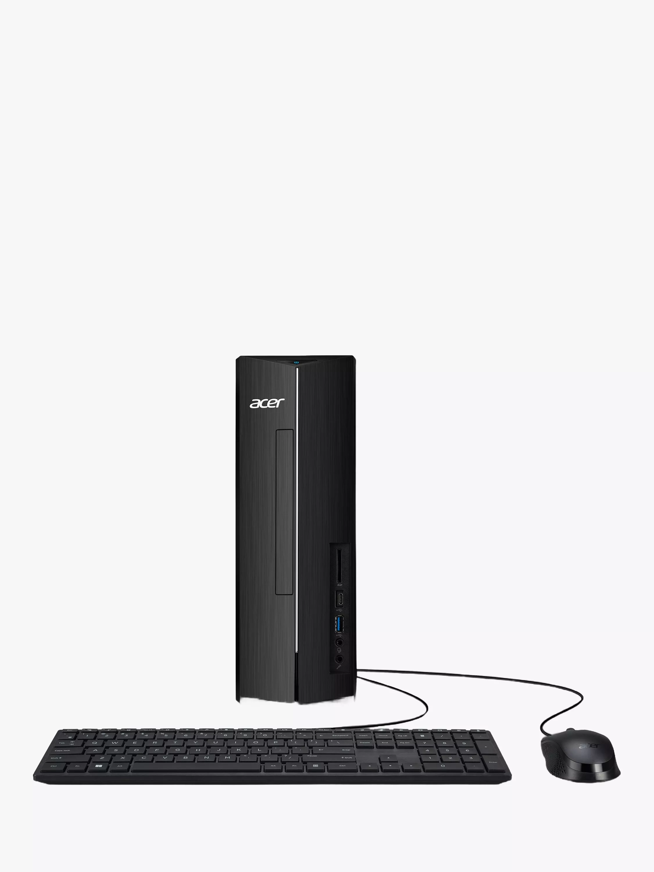 Acer desktop PC tower with wired keyboard and mouse, front USB ports, black brushed finish on dark background
