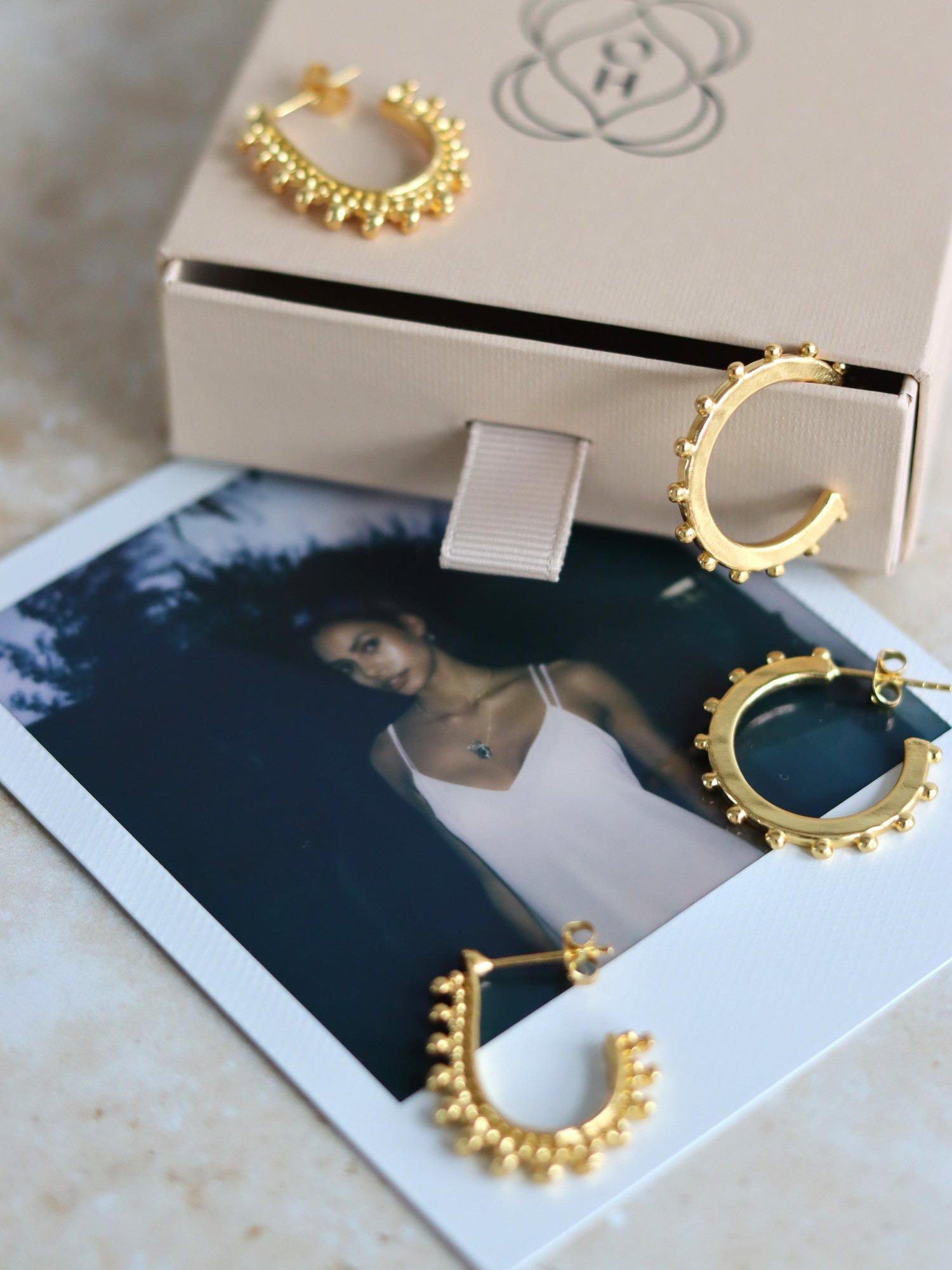 Product image 4 of 6, which shows Ottoman Hands Aida Hoop Earrings, Gold