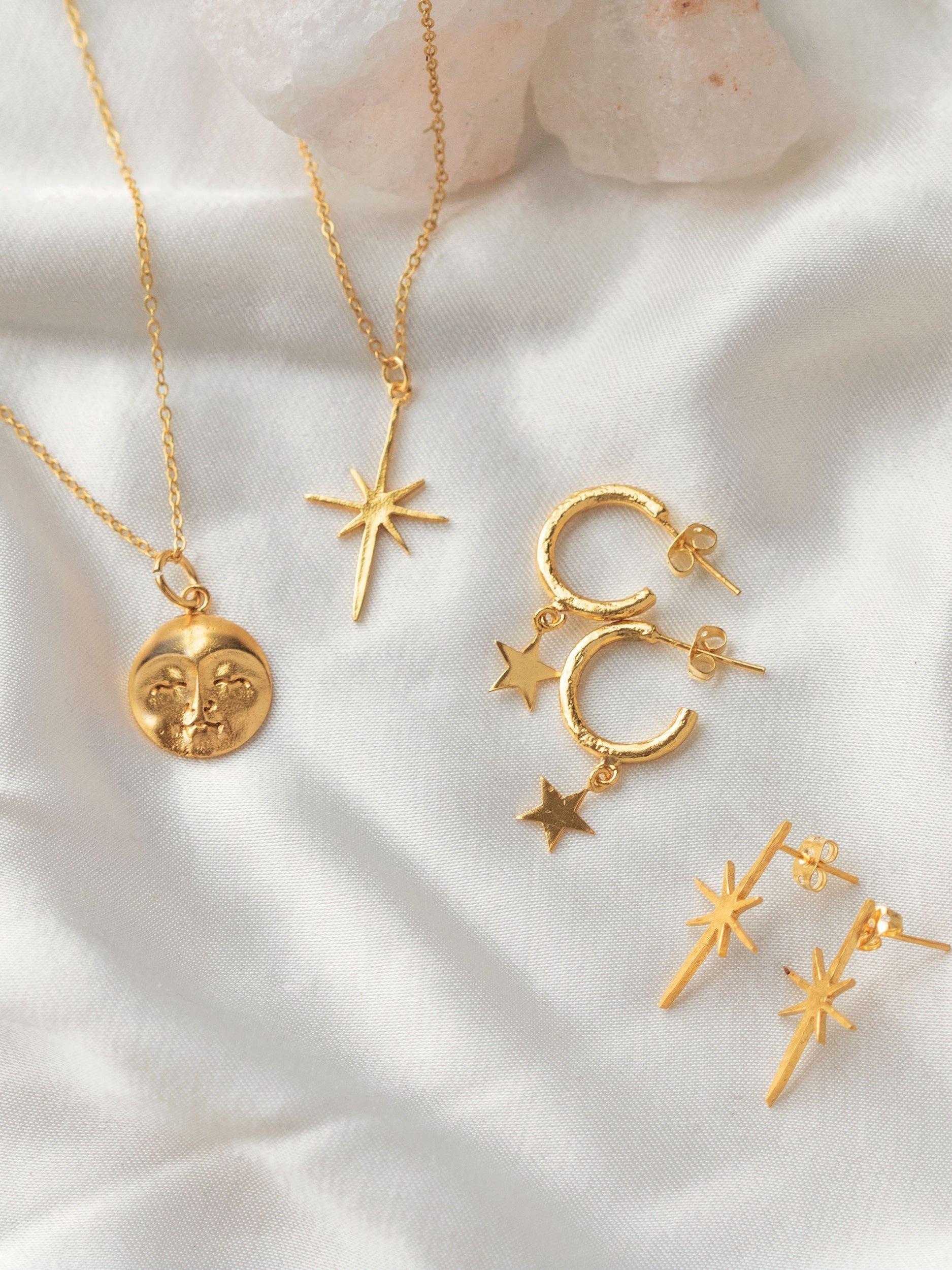 Product image 3 of 8, which shows Ottoman Hands Star Charm Hoop Earrings, Gold