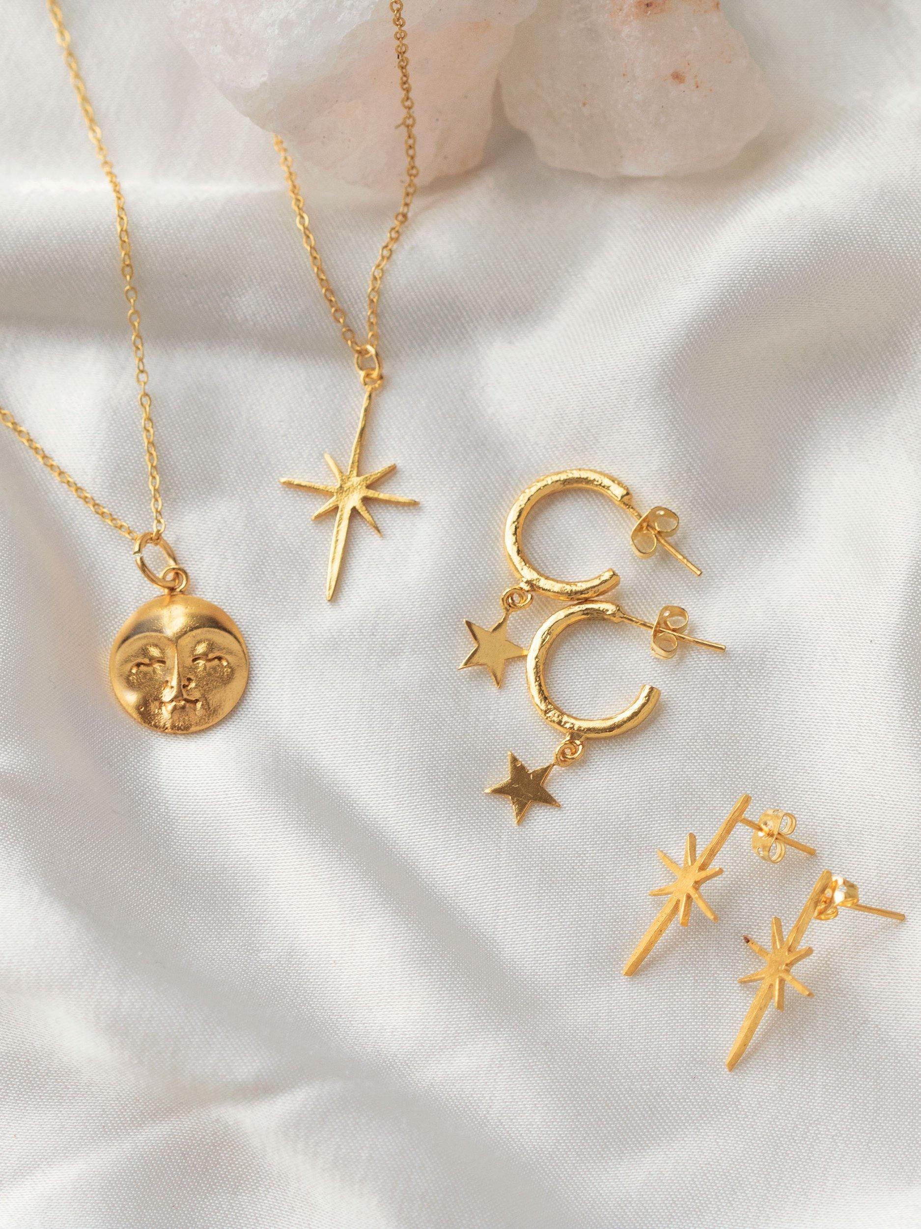 Product image 6 of 8, which shows Ottoman Hands Star Charm Hoop Earrings, Gold