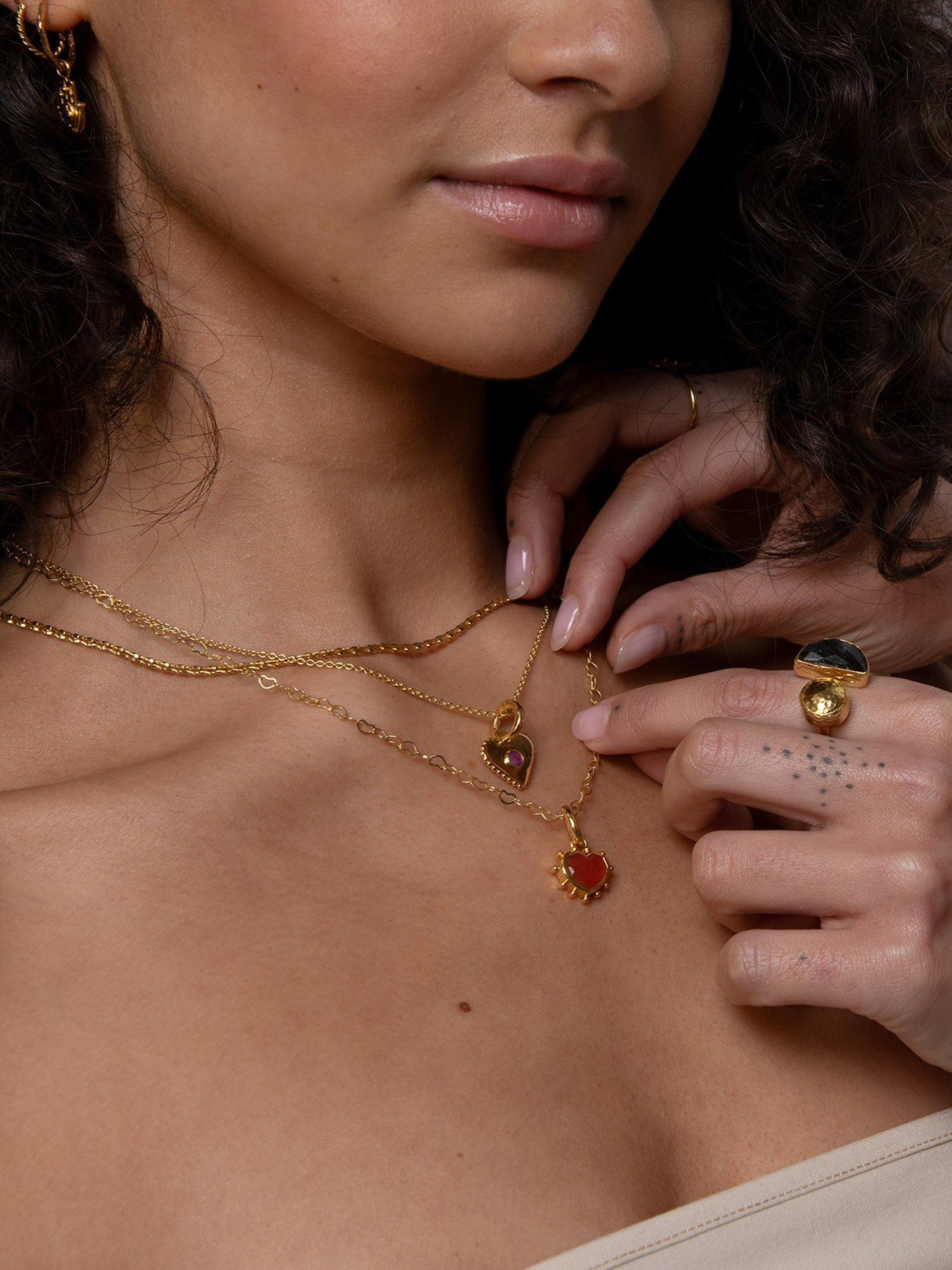 Product image 3 of 5, which shows Ottoman Hands Red Onyx Heart Charm, Gold