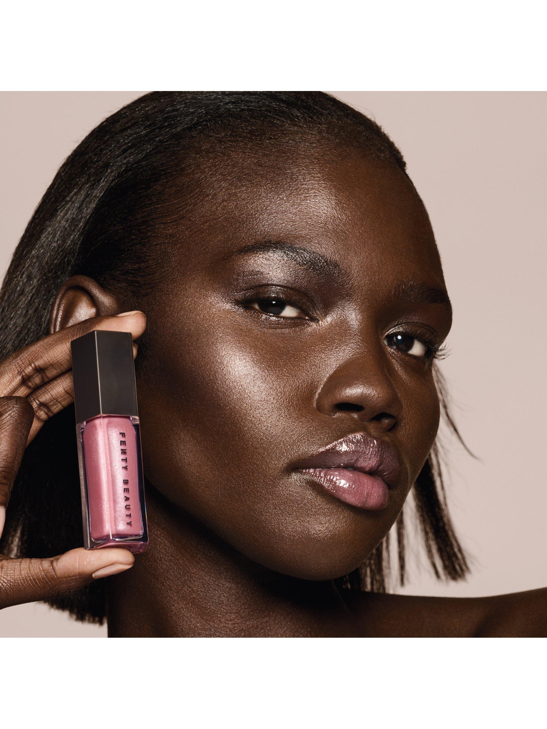 Product image 3 of 8, which shows Fenty Beauty Gloss Bomb Universal Lip Luminiser, Fu$$y