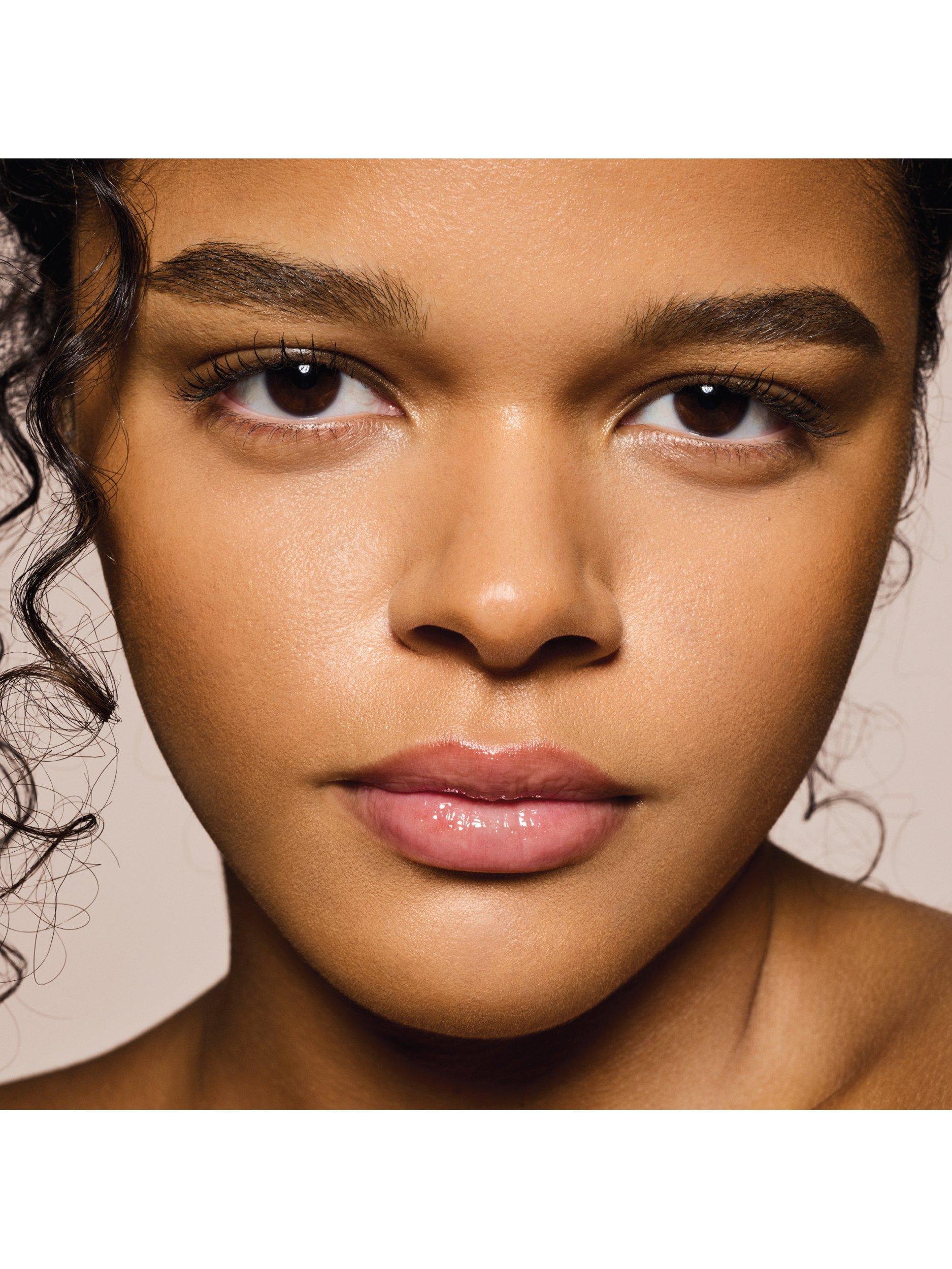 Product image 6 of 8, which shows Fenty Beauty Gloss Bomb Universal Lip Luminiser, Glass Slipper