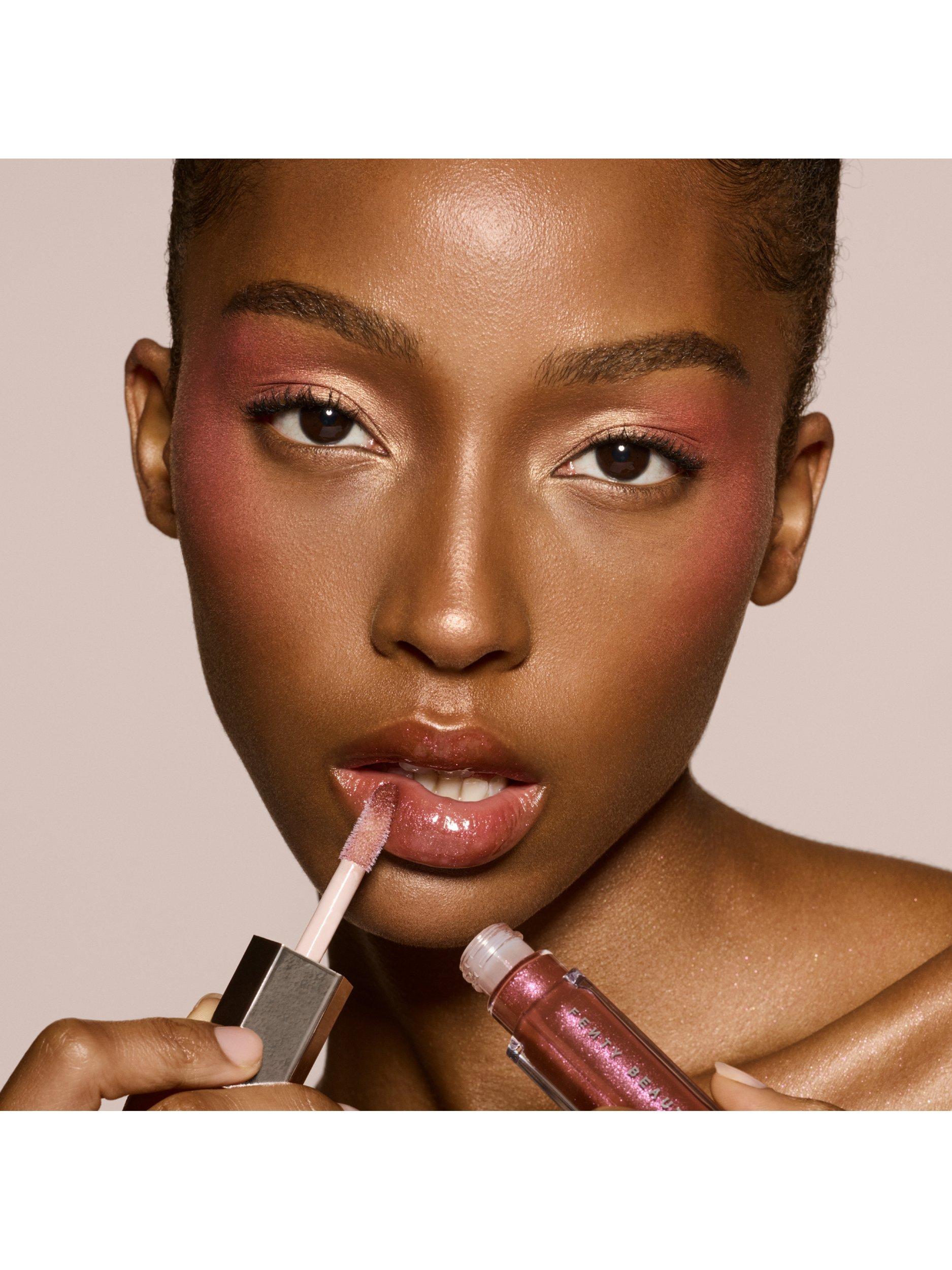 Product image 6 of 8, which shows Fenty Beauty Gloss Bomb Universal Lip Luminiser, Hot Chocolit