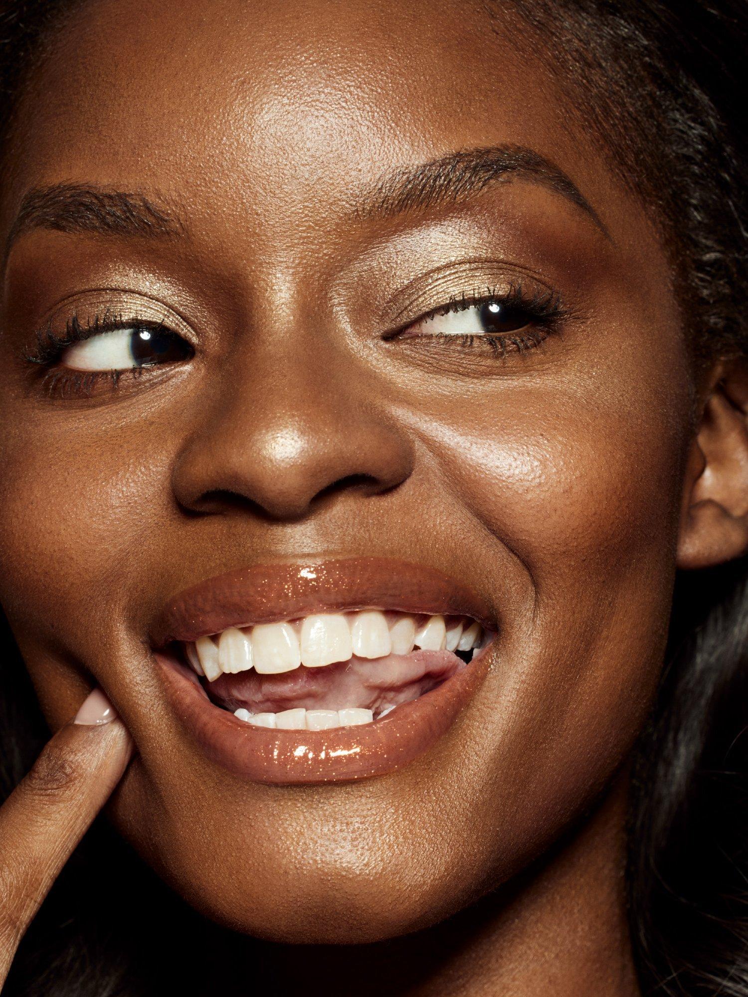 Product image 5 of 7, which shows Fenty Beauty Gloss Bomb Universal Lip Luminiser, Mango Margz