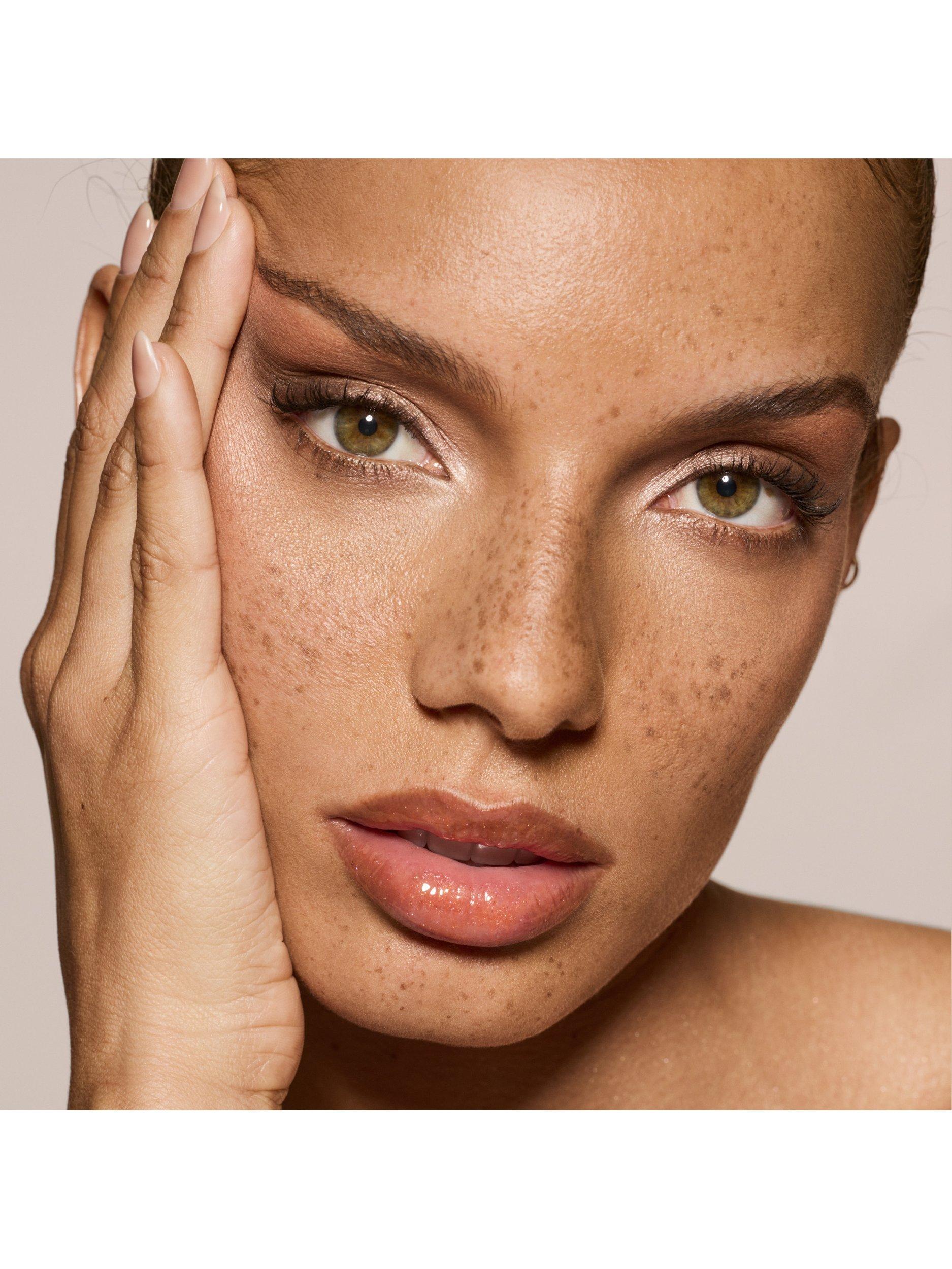 Product image 6 of 7, which shows Fenty Beauty Gloss Bomb Universal Lip Luminiser, Mango Margz