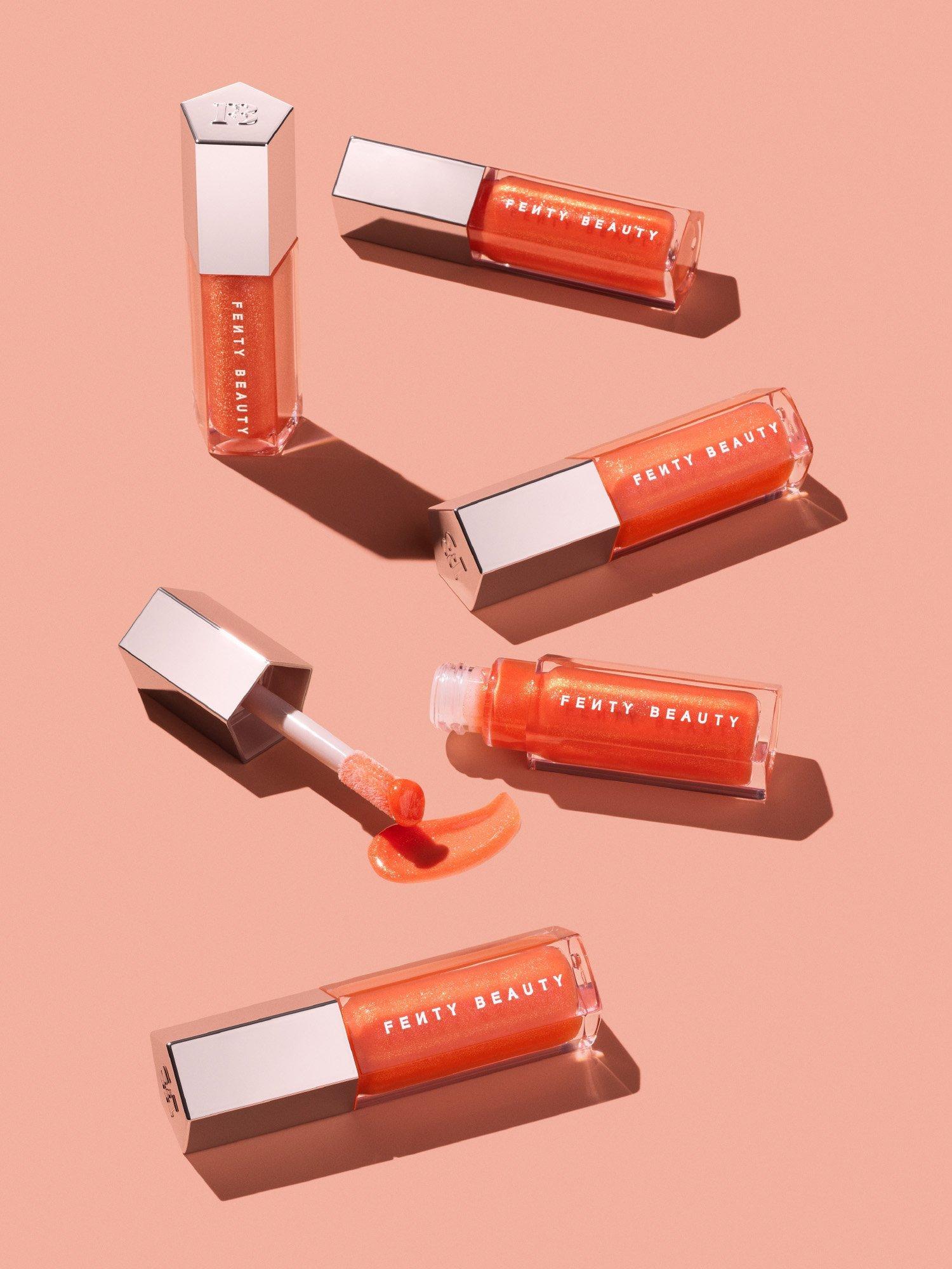 Product image 7 of 7, which shows Fenty Beauty Gloss Bomb Universal Lip Luminiser, Mango Margz