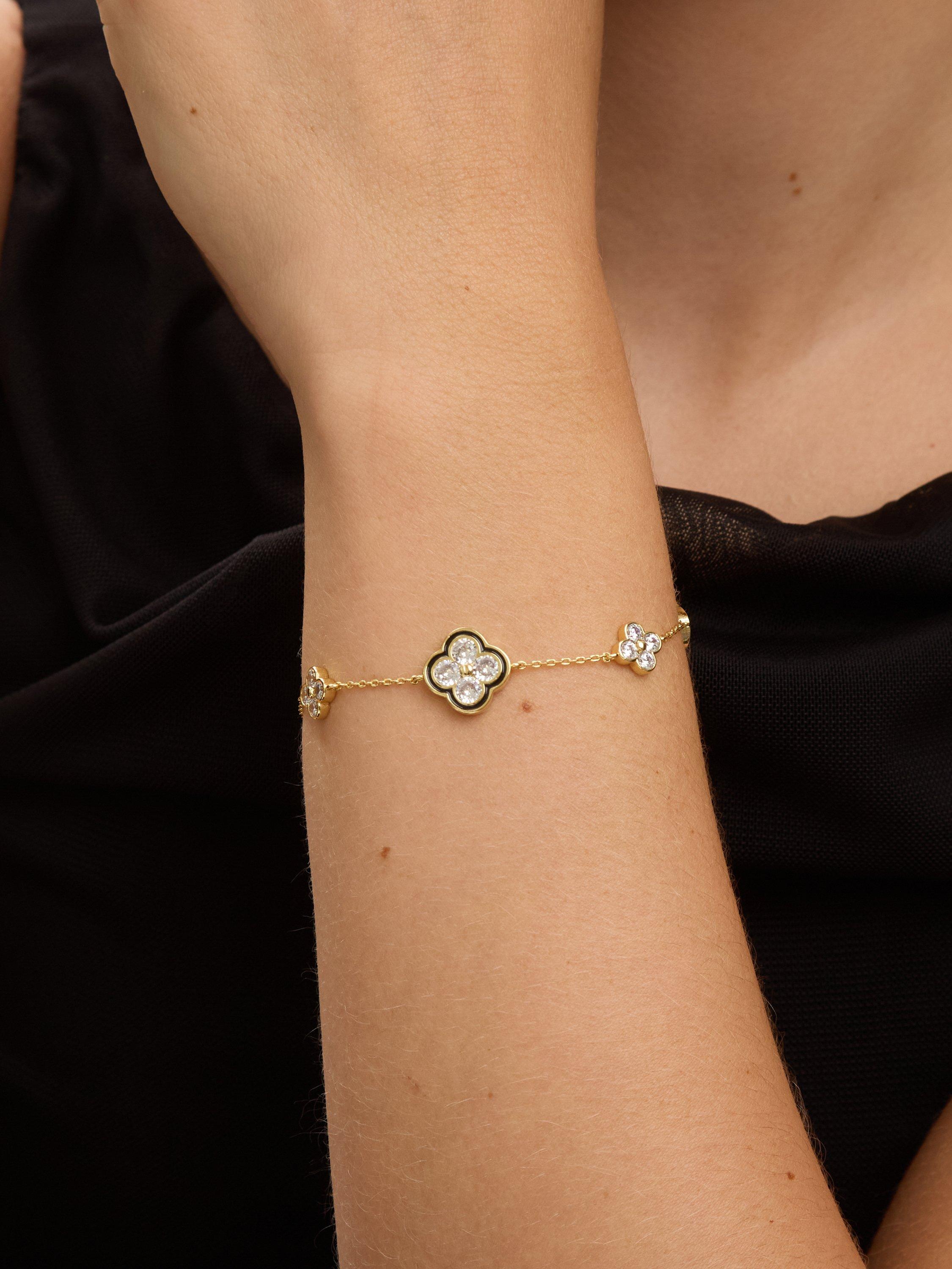 Product image 3 of 5, which shows Jon Richard Crystal Clover Bracelet, Gold/Jet