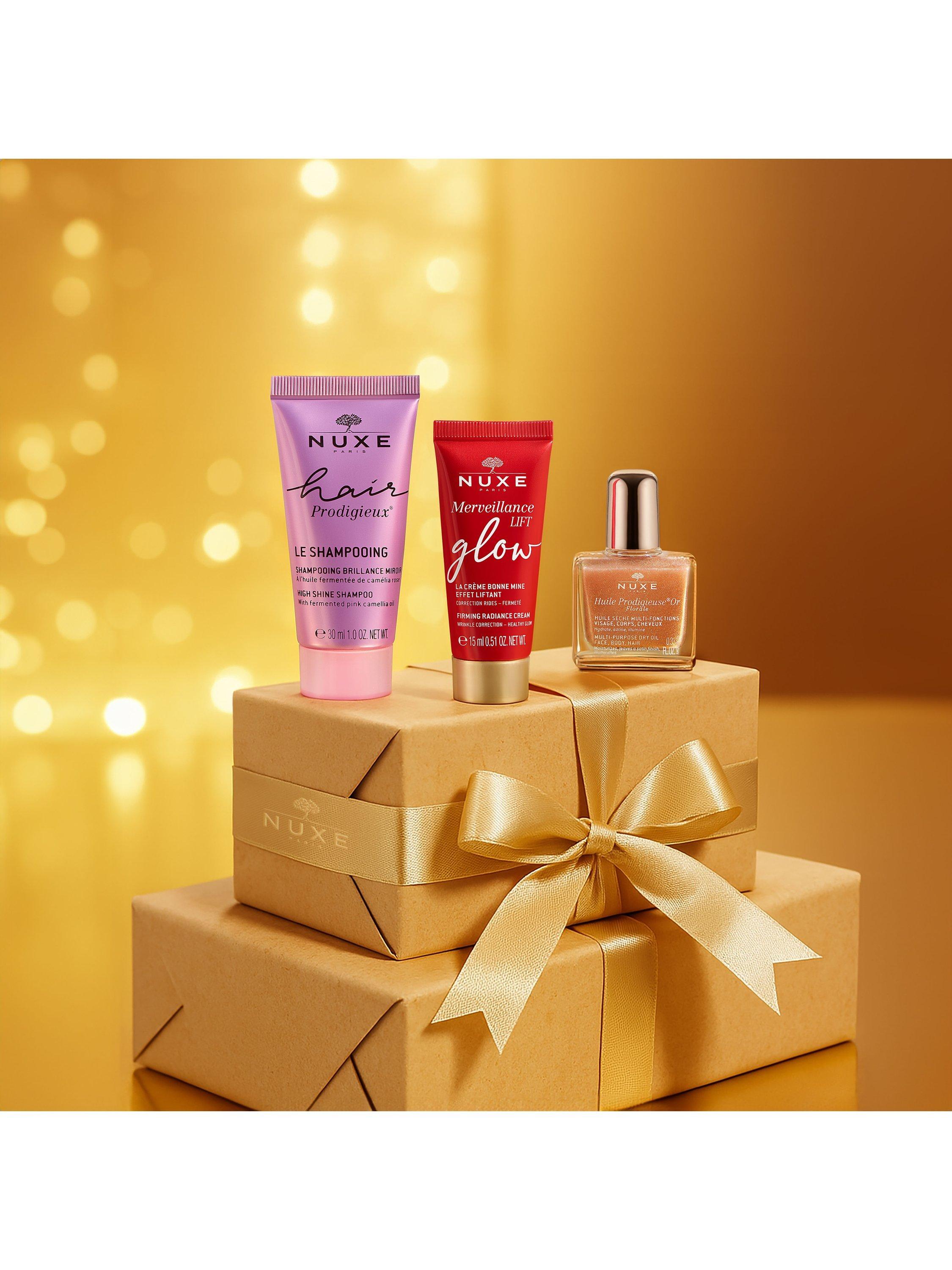 Product image 4 of 4, which shows NUXE Your Festive Glow Beauty Cracker Bodycare Gift Set