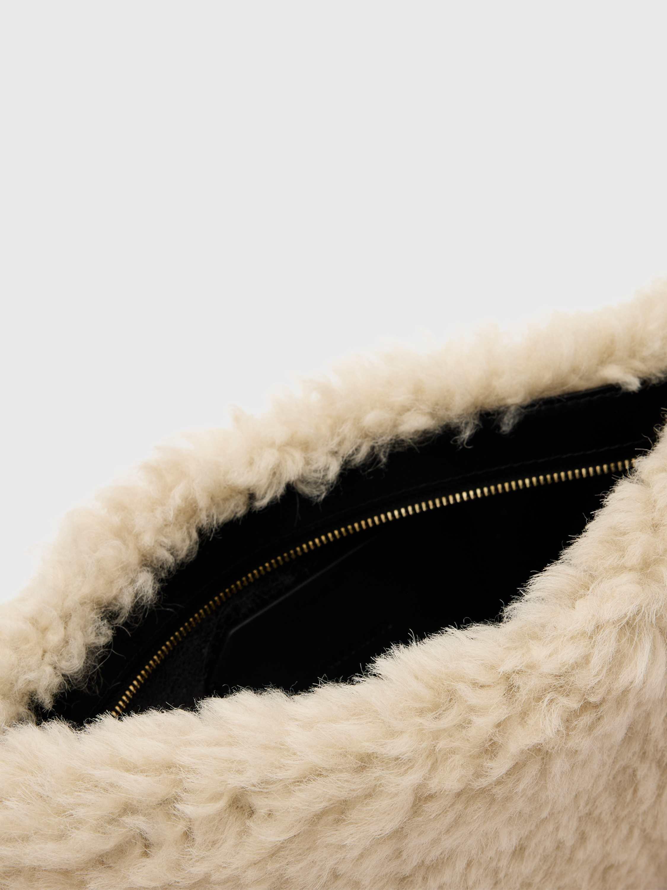 Product image 3 of 6, which shows AllSaints Bettina Shearling Clutch Bag, Natural