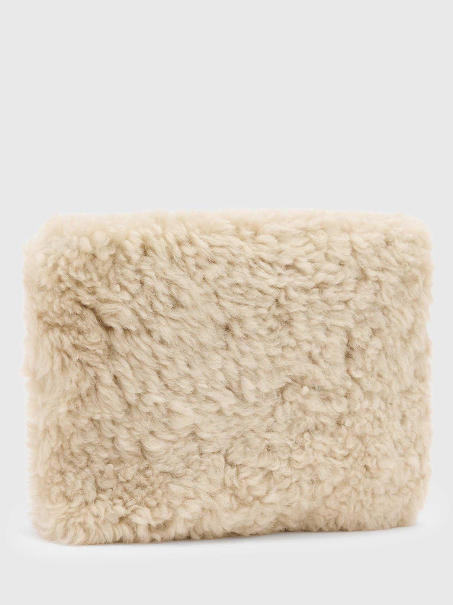 Product image 5 of 6, which shows AllSaints Bettina Shearling Clutch Bag, Natural