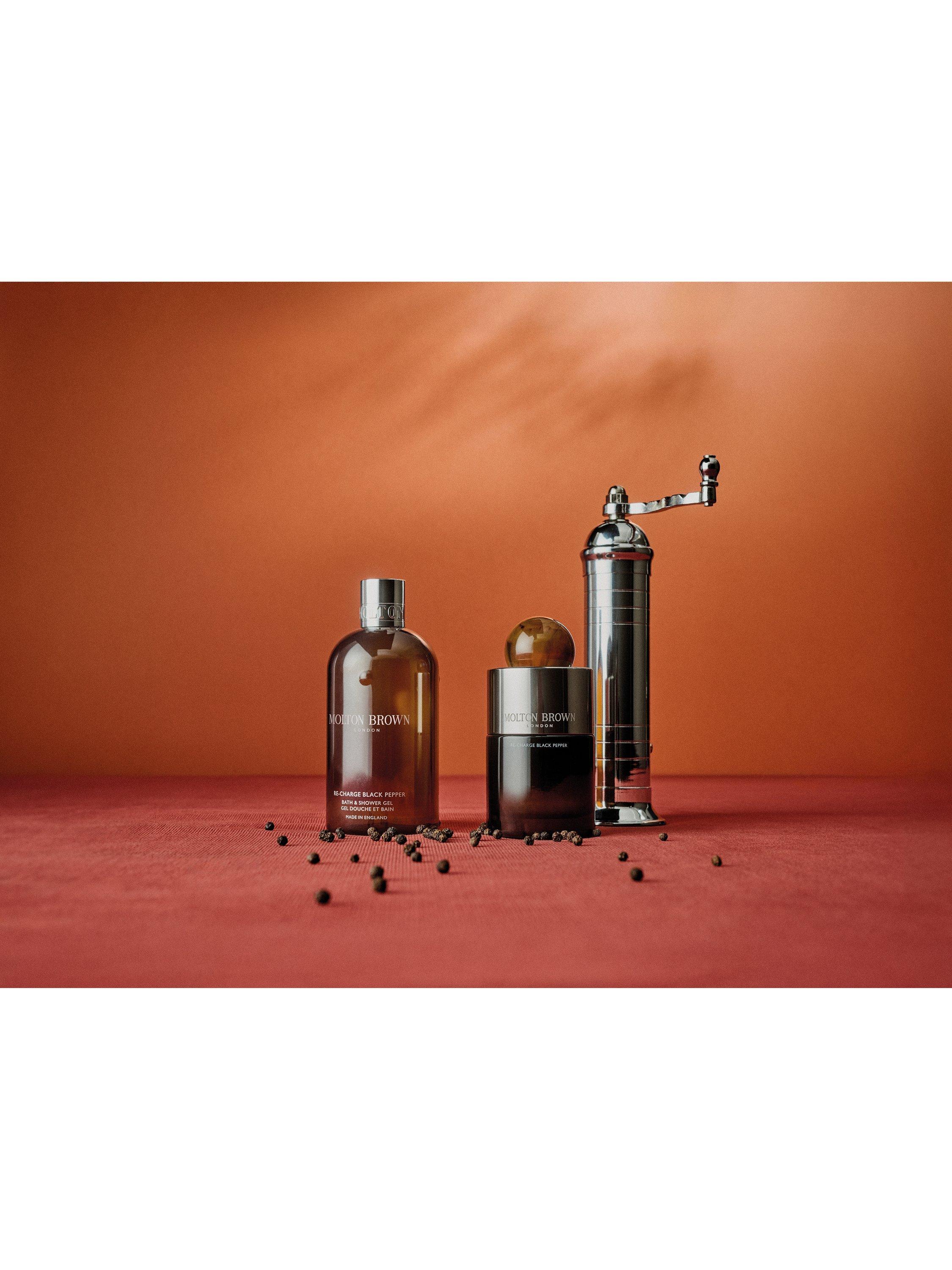 Product image 4 of 4, which shows Molton Brown Re-charge Black Pepper Festive Bauble