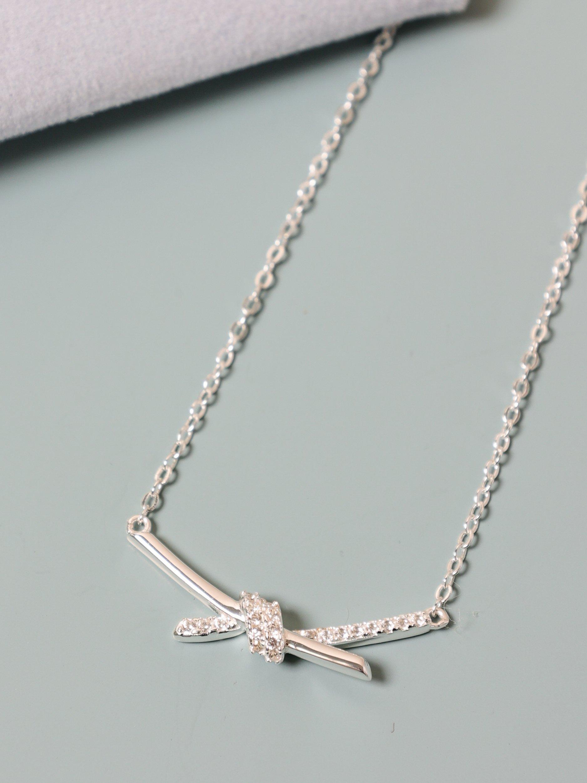 Product image 3 of 5, which shows Simply Silver Polished Pave Love Knot Necklace