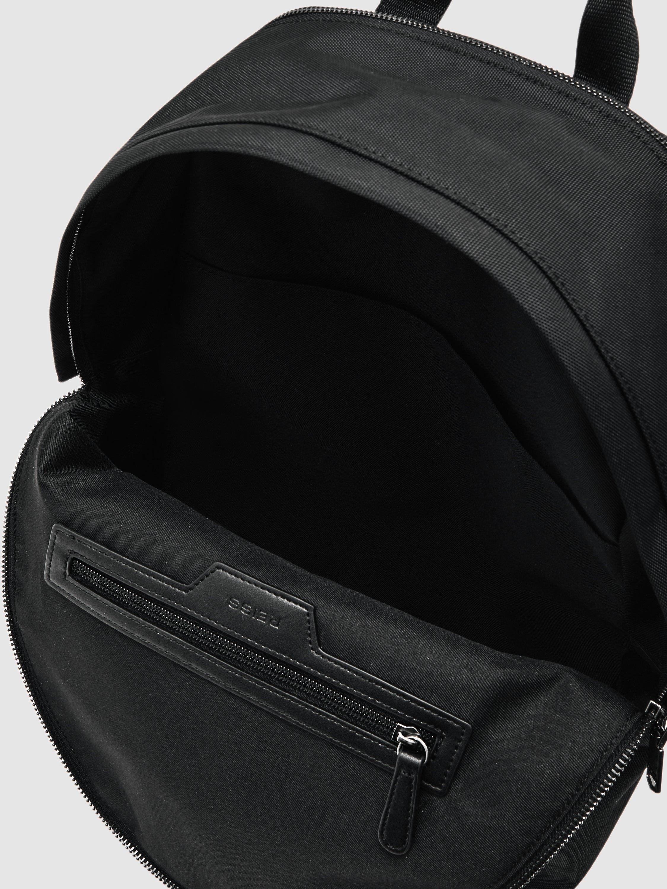 Product image 4 of 5, which shows Reiss Allen Woven Zipped Backpack, Black