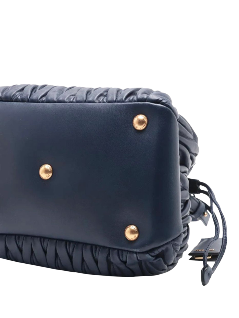 Product image 3 of 10, which shows Pre-loved Miu Miu Matelassé Leather 2-Way Bucket Bag, Dark Blue