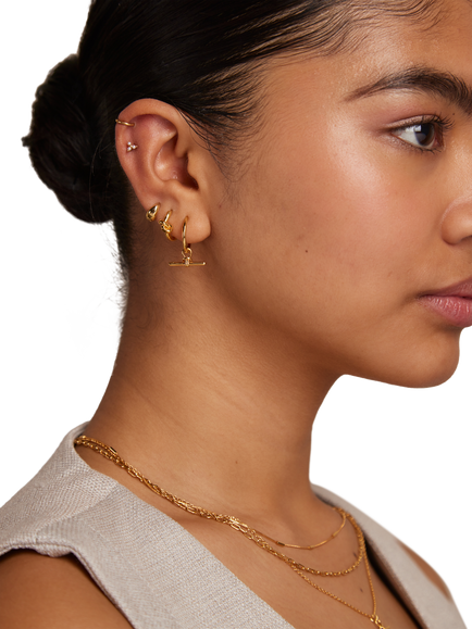 Orelia Polished Knot Huggie Hoop Earrings, Pale Gold - view 2, Pale Gold