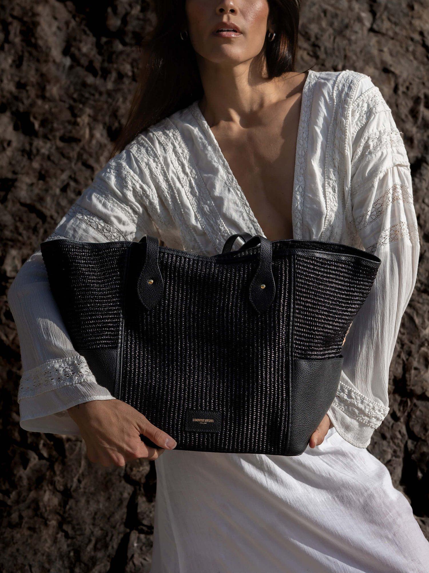 Product image 5 of 9, which shows Cambridge Satchel Raffia Tote Bag, Black