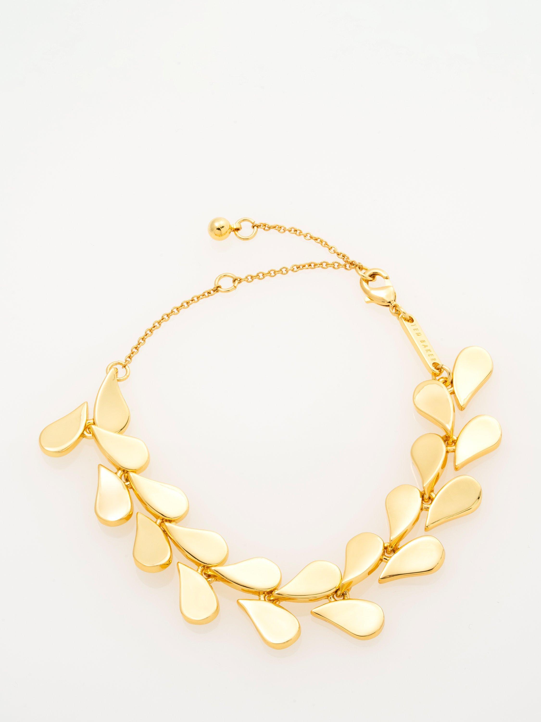 Product image 4 of 6, which shows Ted Baker Anya Abstract Heart Bracelet, Gold Tone