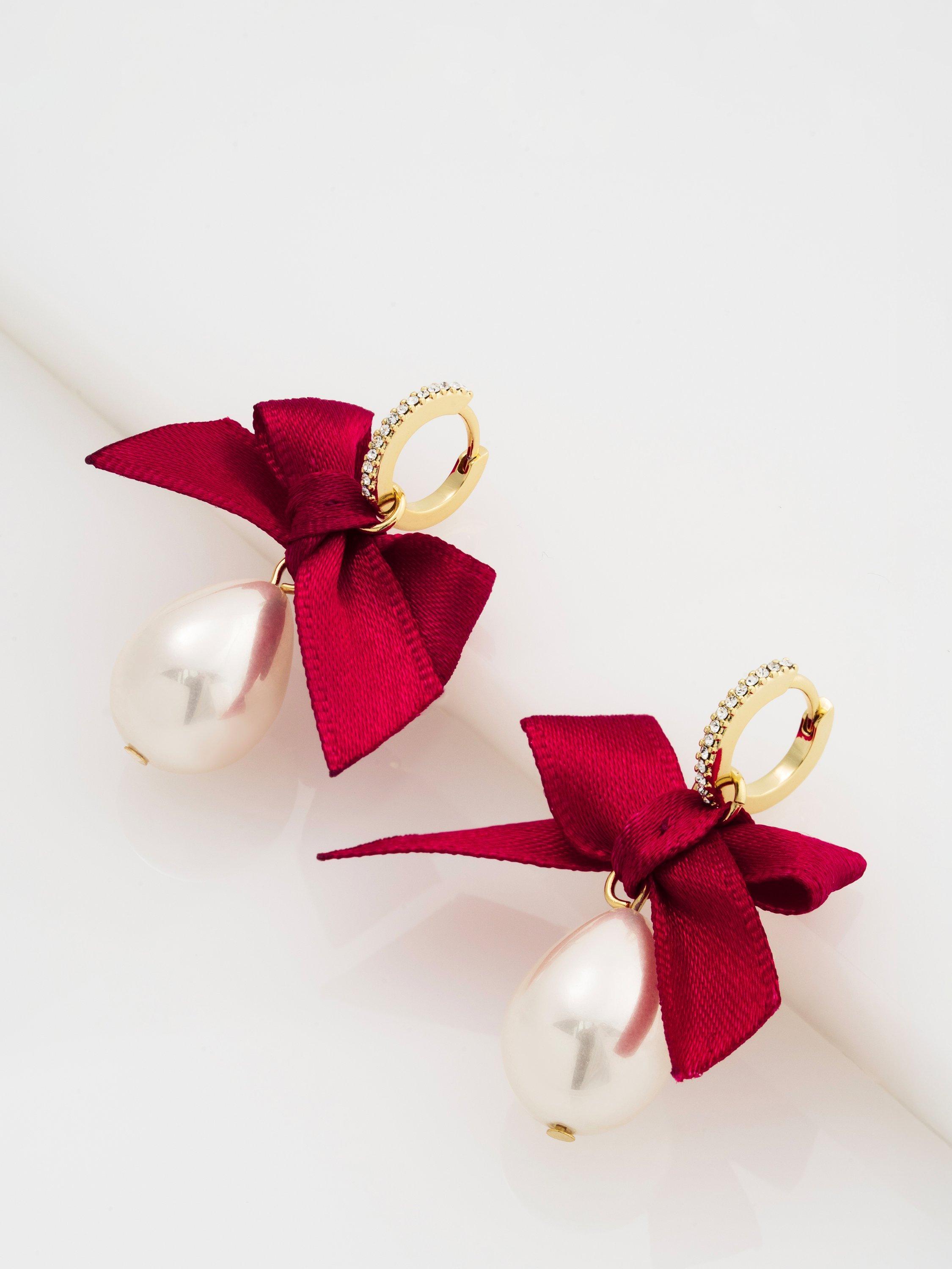Product image 4 of 6, which shows Ted Baker Riyya Ribbon Bow Pearl Drop Huggie Earrings, Gold/Ruby