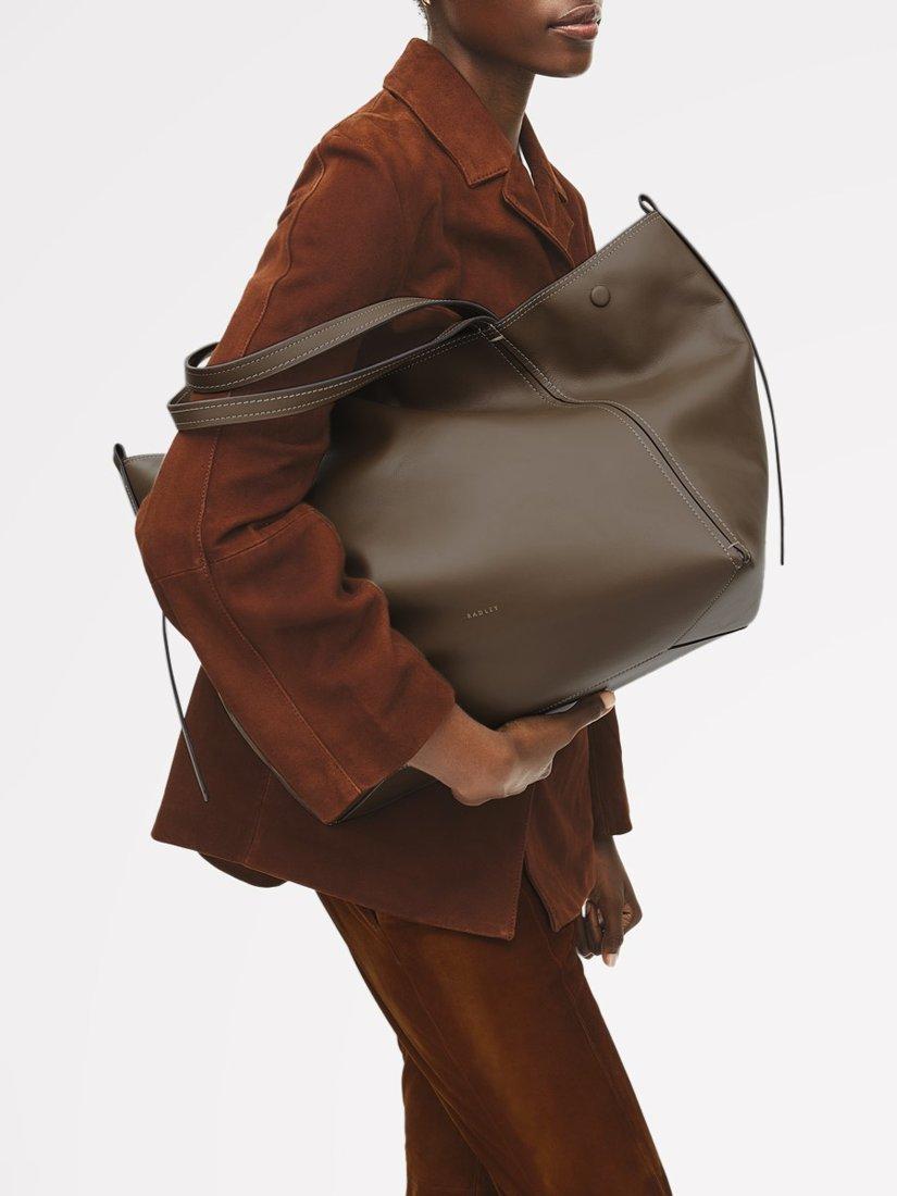 Product image 7 of 9, which shows Radley The Delphine Leather Extra Large Tote Bag, Coffee