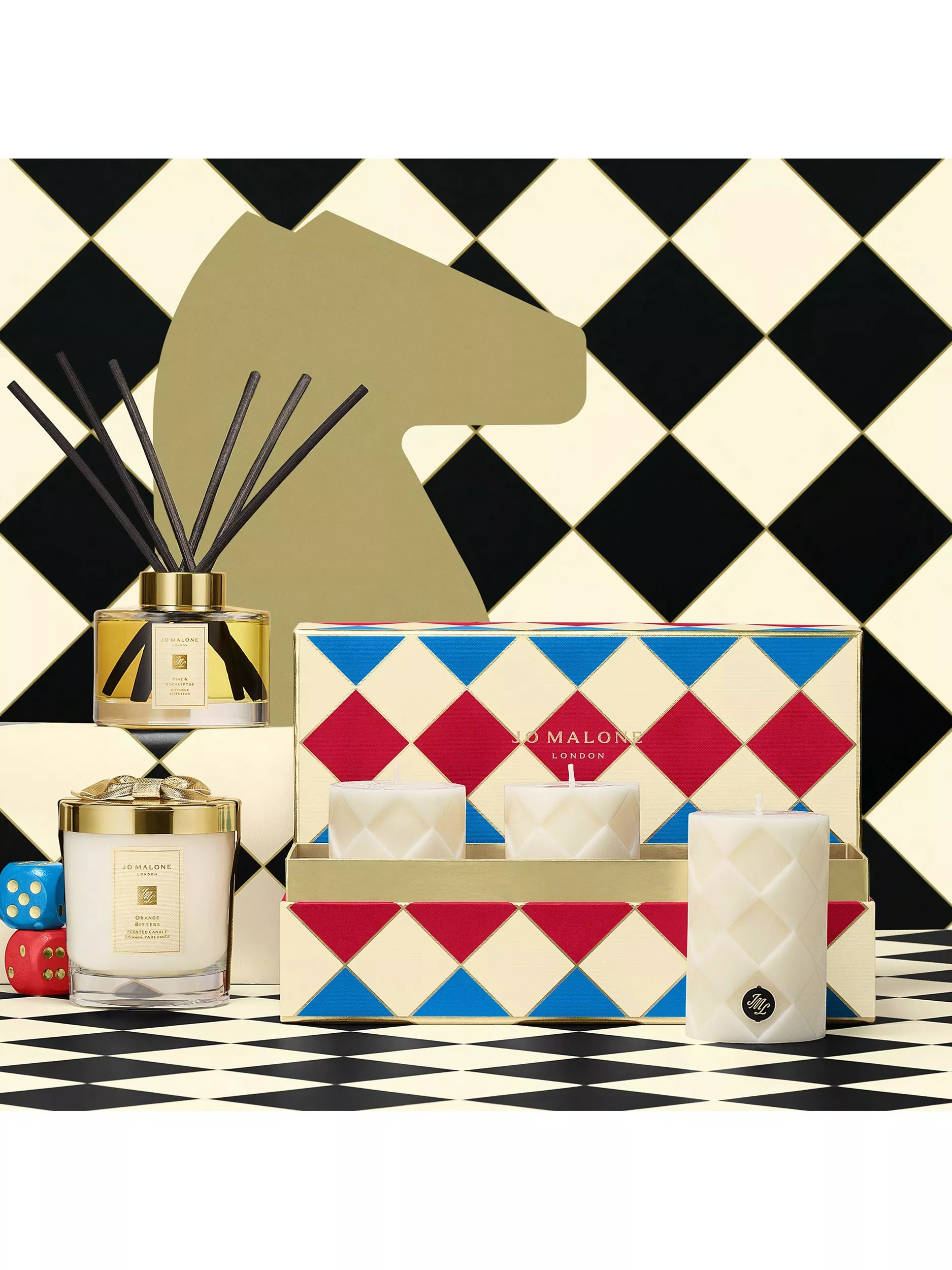 Image of the Jo Malone London Ginger Biscuit Pillar Candle Collection Christmas Gift Set in cream
