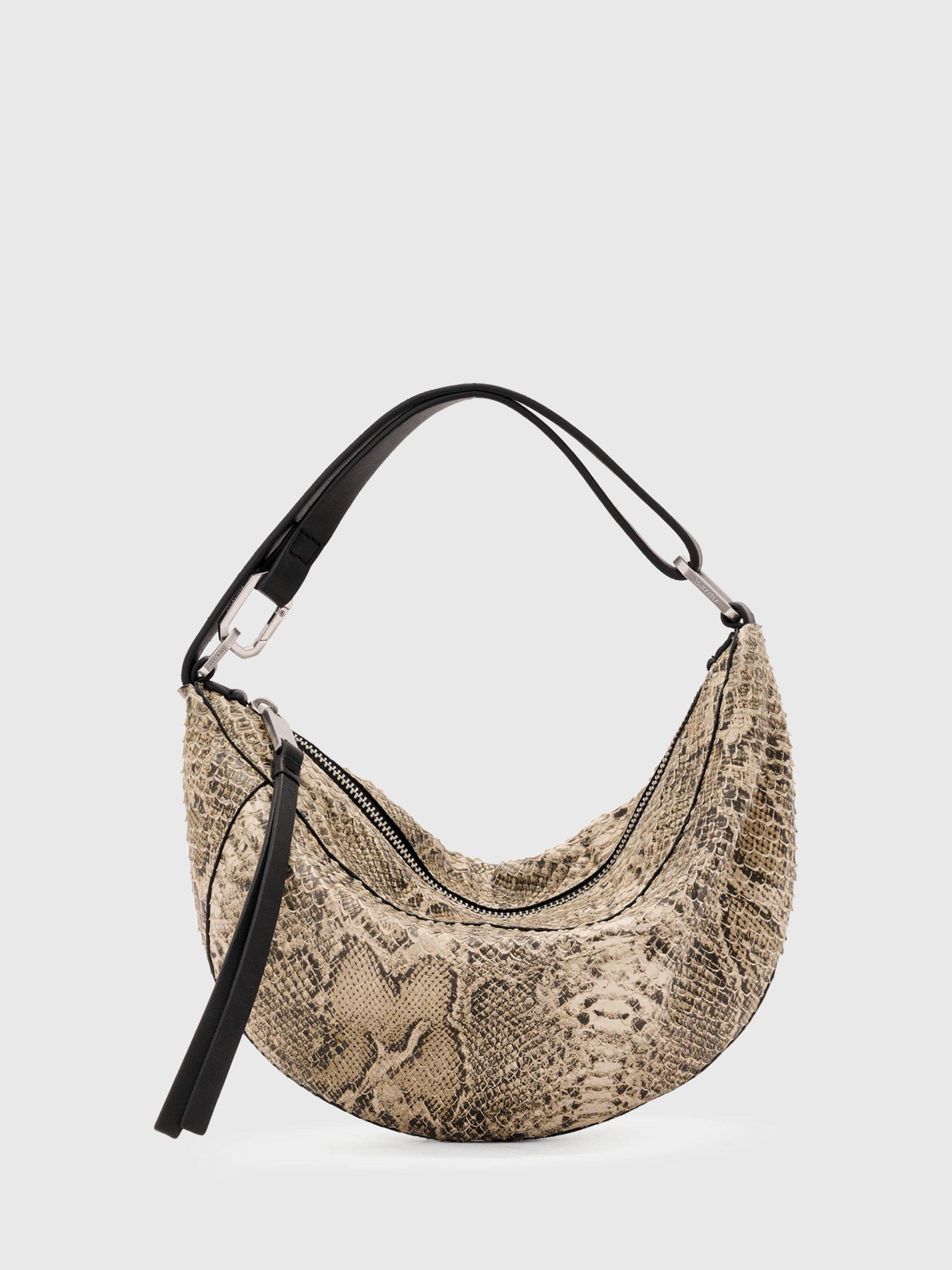 Product image 1 of 7, which shows AllSaints Luna Micro Snake Bag, White