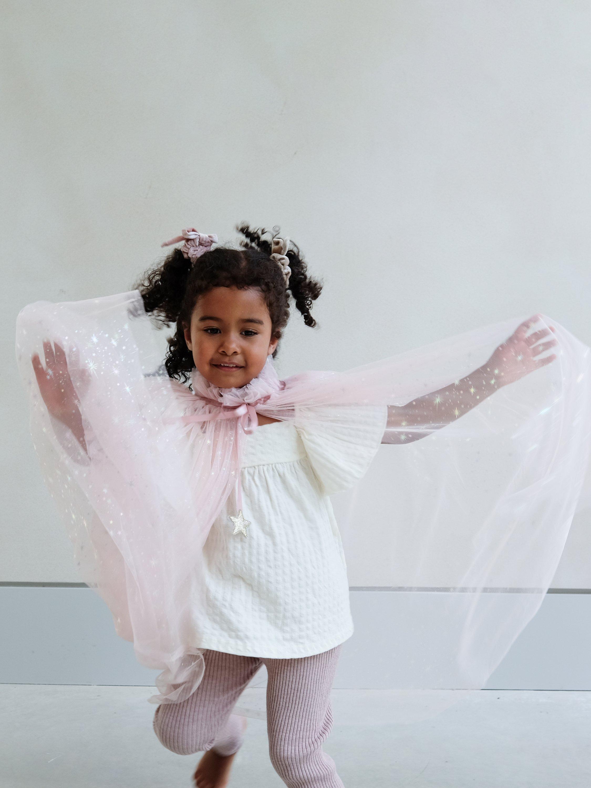 Product image 2 of 7, which shows Mimi & Lula Kids' Princess Tulle Cape, Pink
