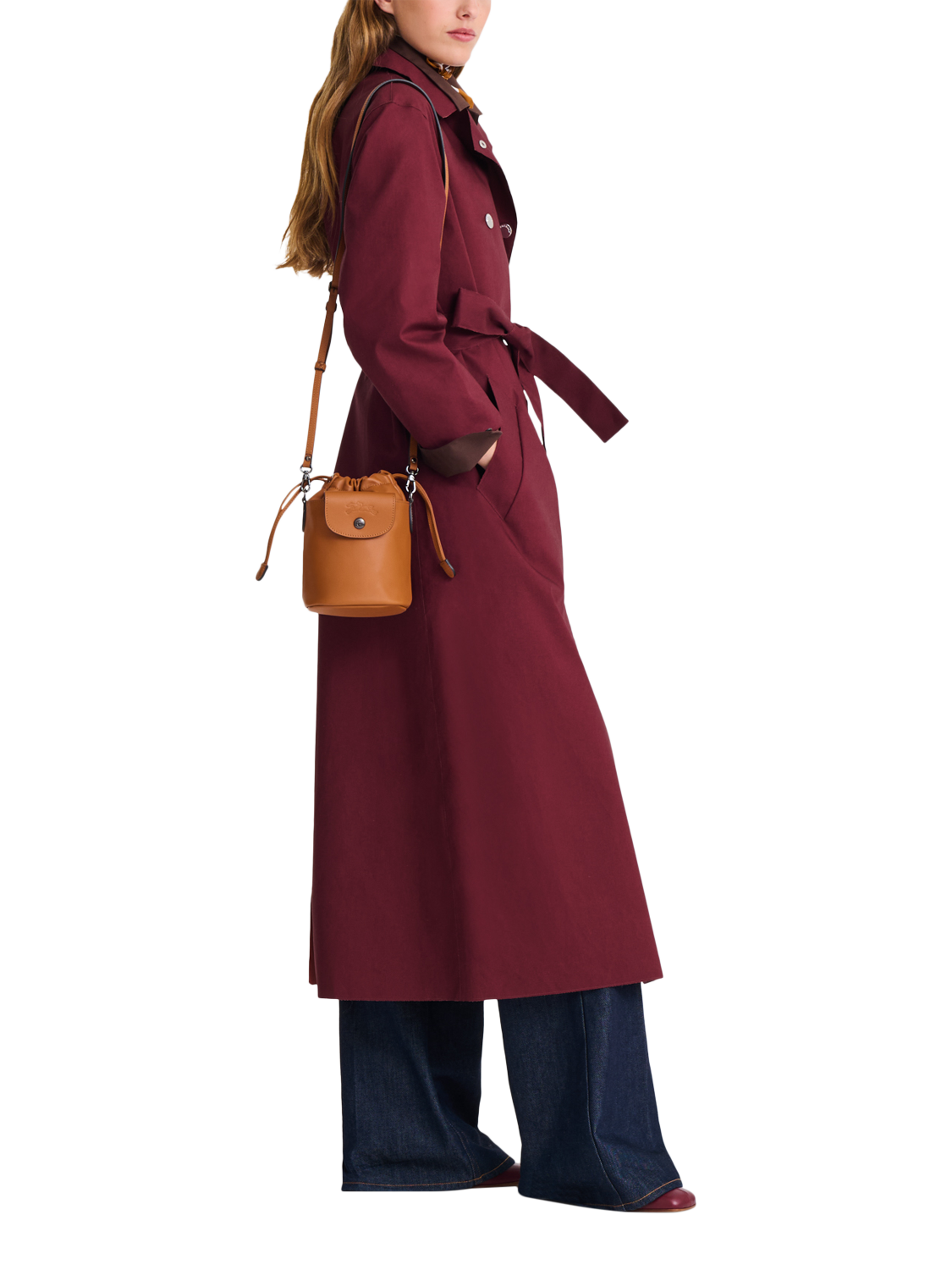 Product image 2 of 6, which shows Longchamp Pliage Extra Small Leather Bucket Bag, Cashew