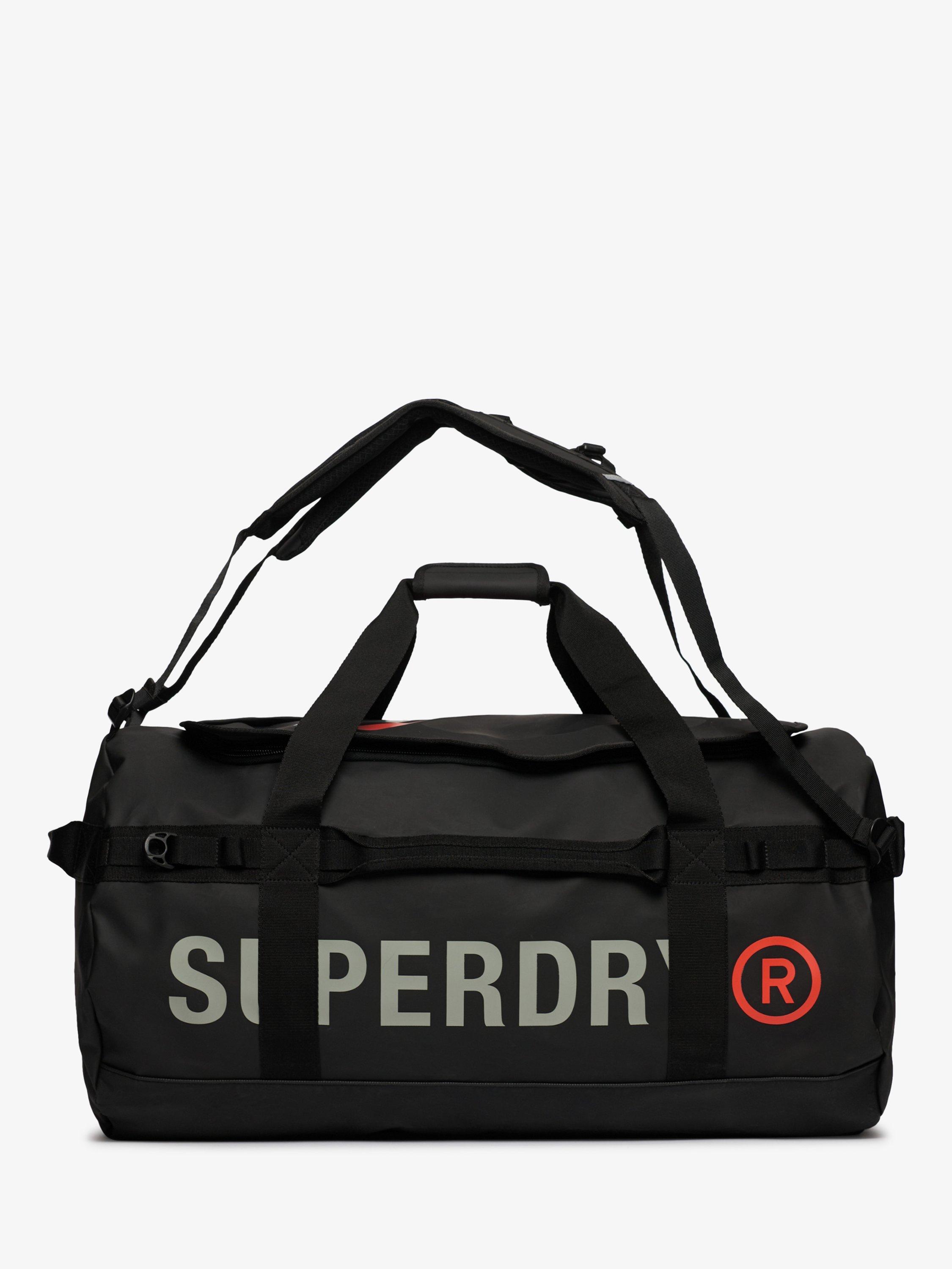 Product image 1 of 7, which shows Superdry Tarp Barrel Bag, Black