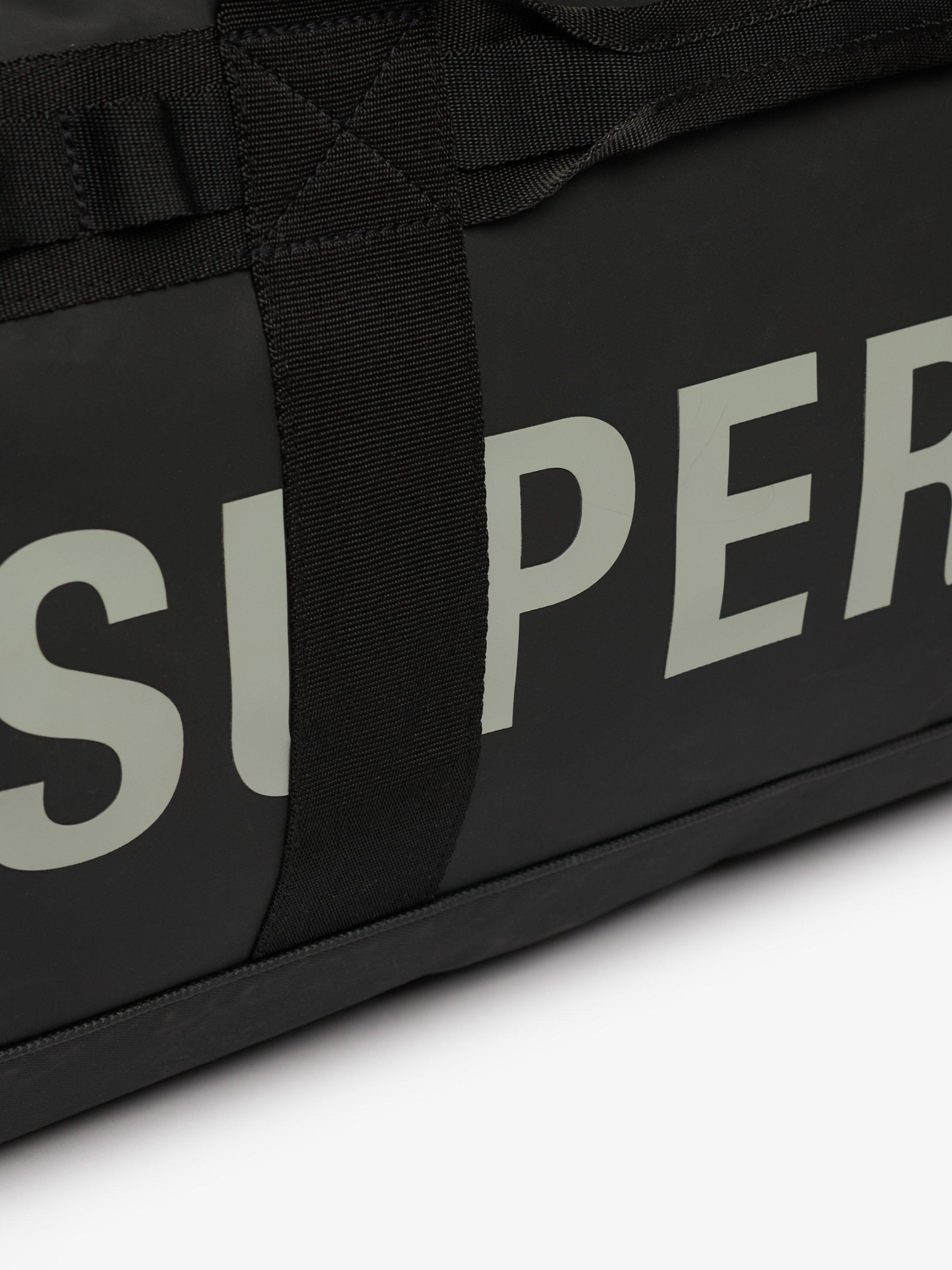 Product image 3 of 7, which shows Superdry Tarp Barrel Bag, Black