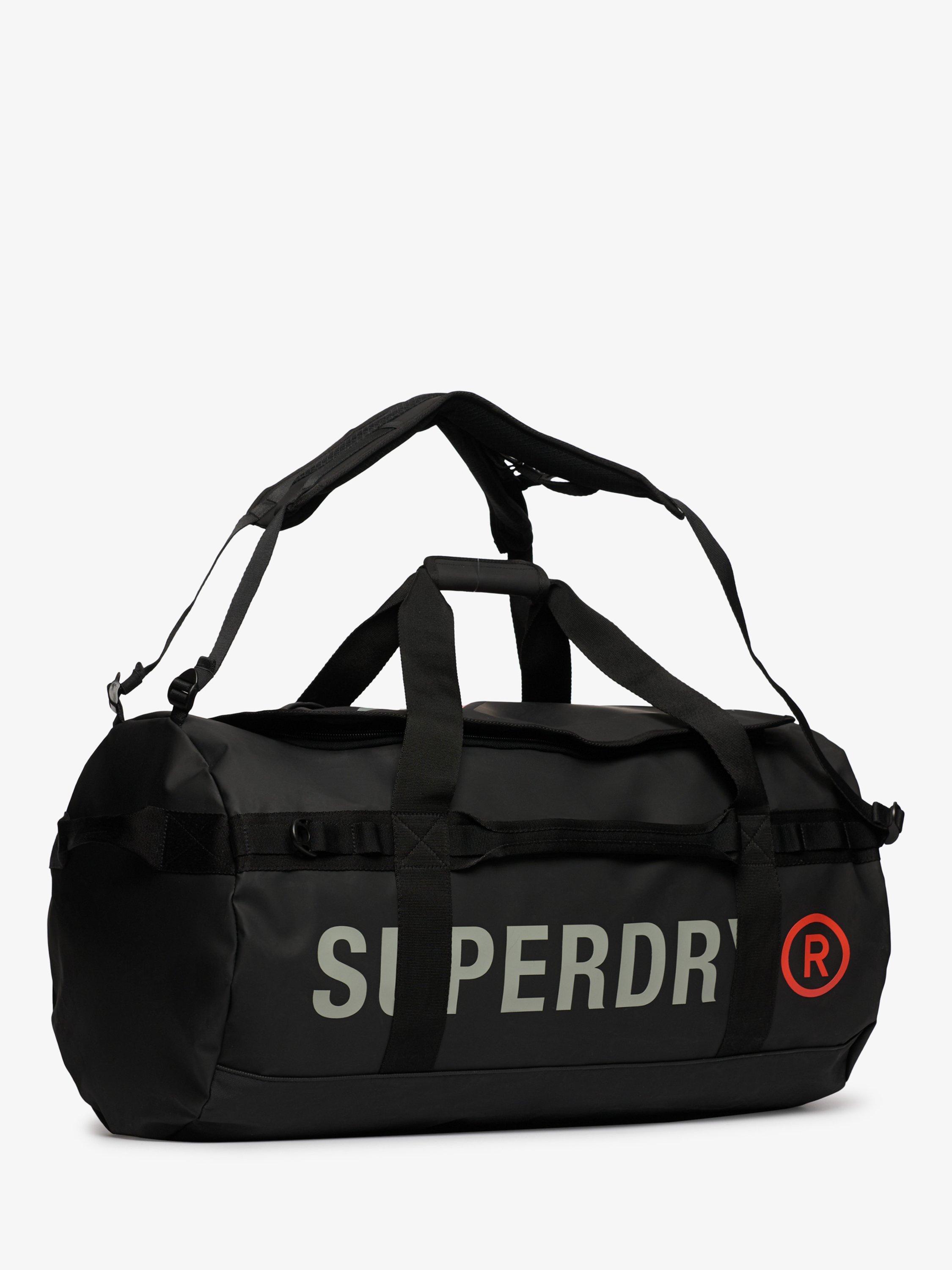 Product image 4 of 7, which shows Superdry Tarp Barrel Bag, Black