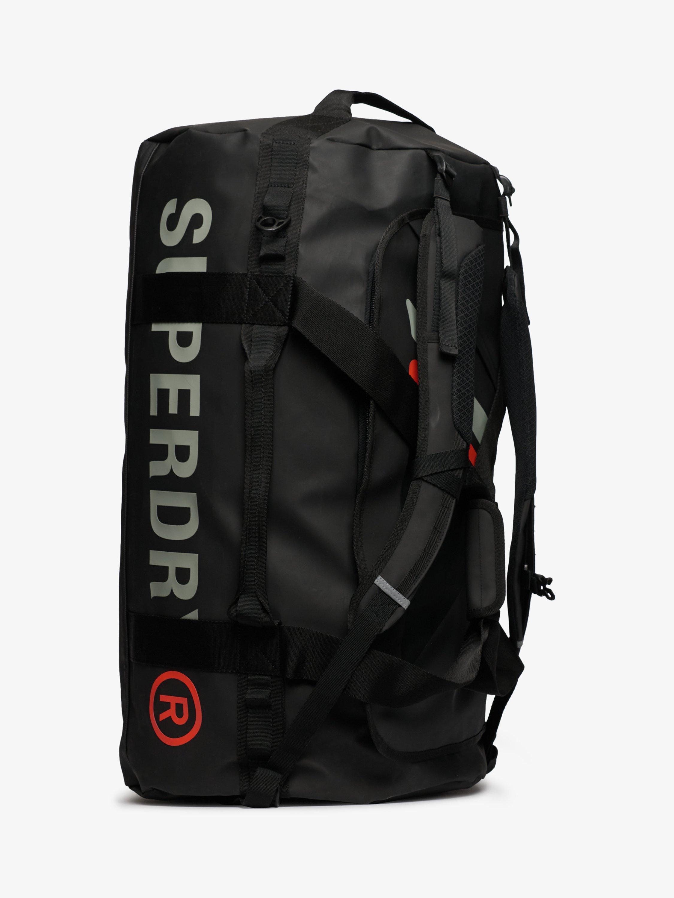 Product image 5 of 7, which shows Superdry Tarp Barrel Bag, Black