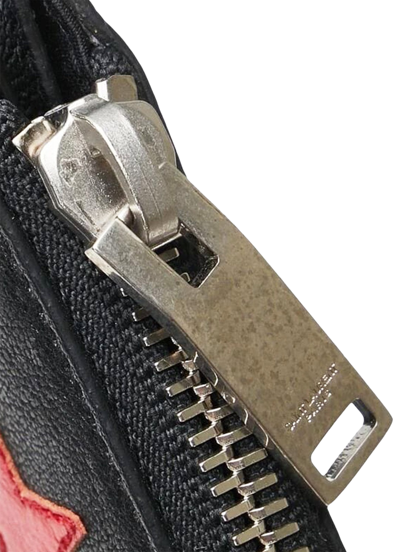 Product image 8 of 10, which shows Pre-loved SAINT LAURENT Star Leather Clutch Bag, Black