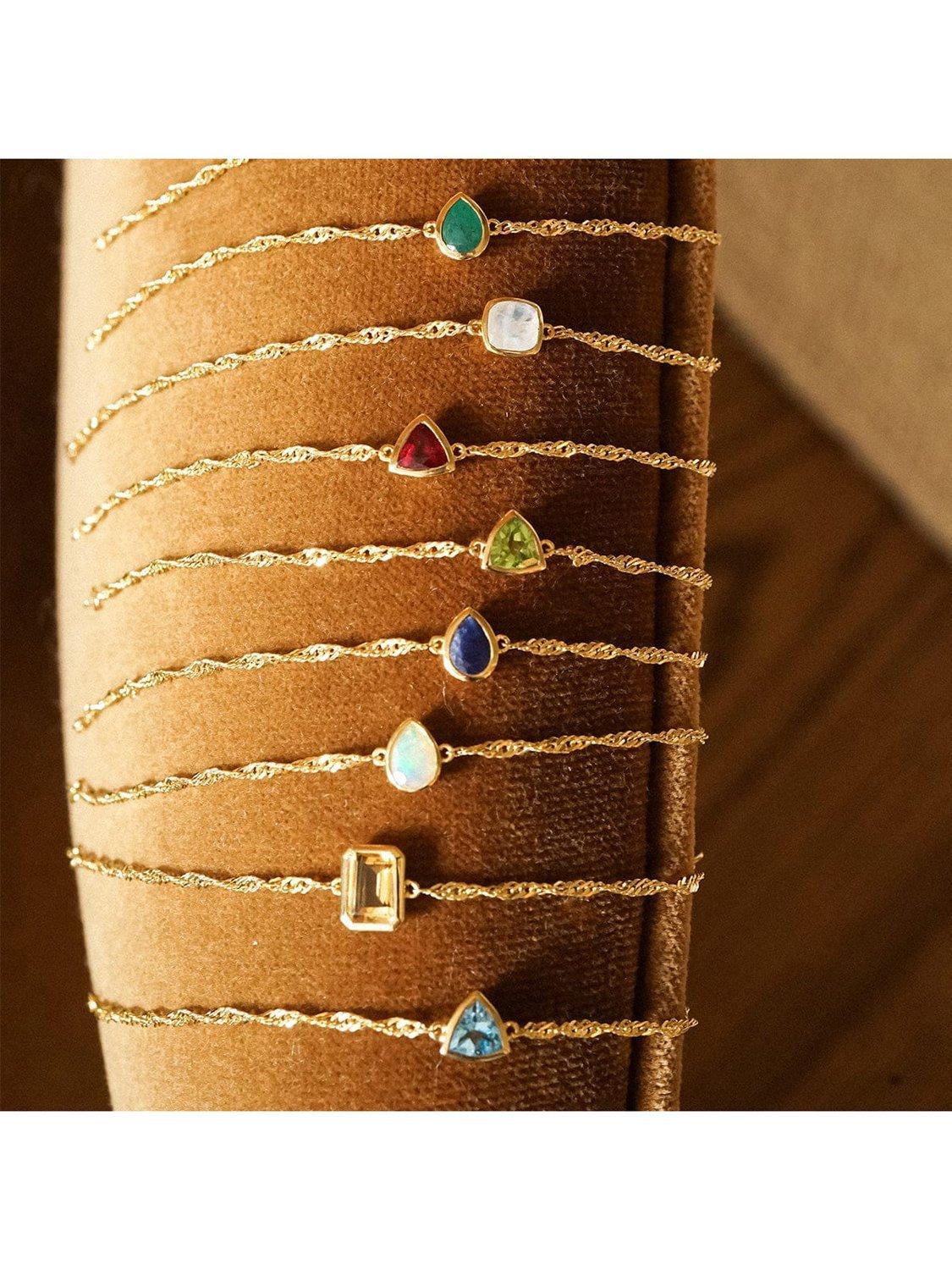 Product image 3 of 3, which shows Daisy London Birthstone Bracelet, October/Opal, Yellow Gold