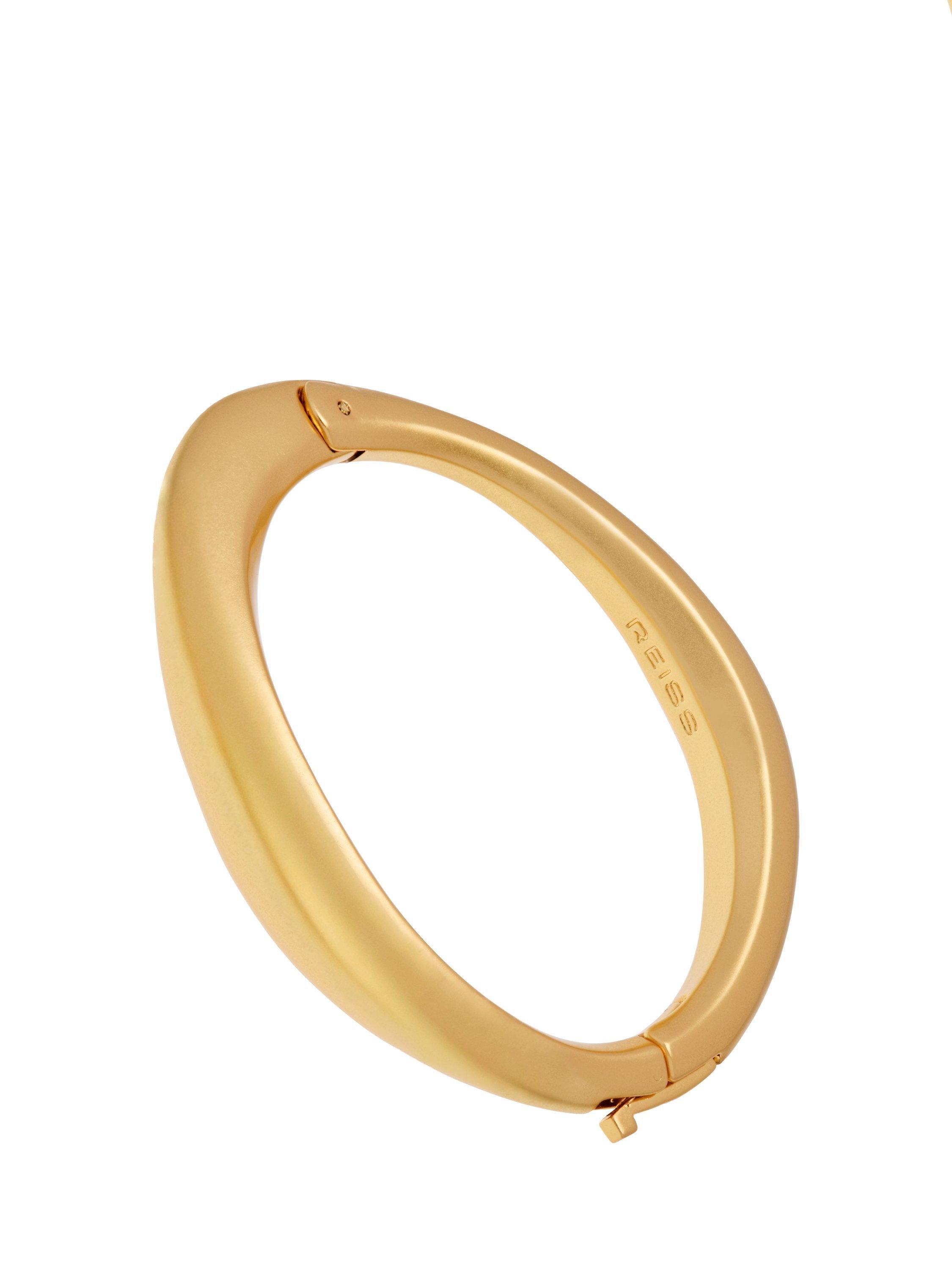 Product image 2 of 5, which shows Reiss Sierra Smooth Curved Hinged Bangle Bracelet, Gold