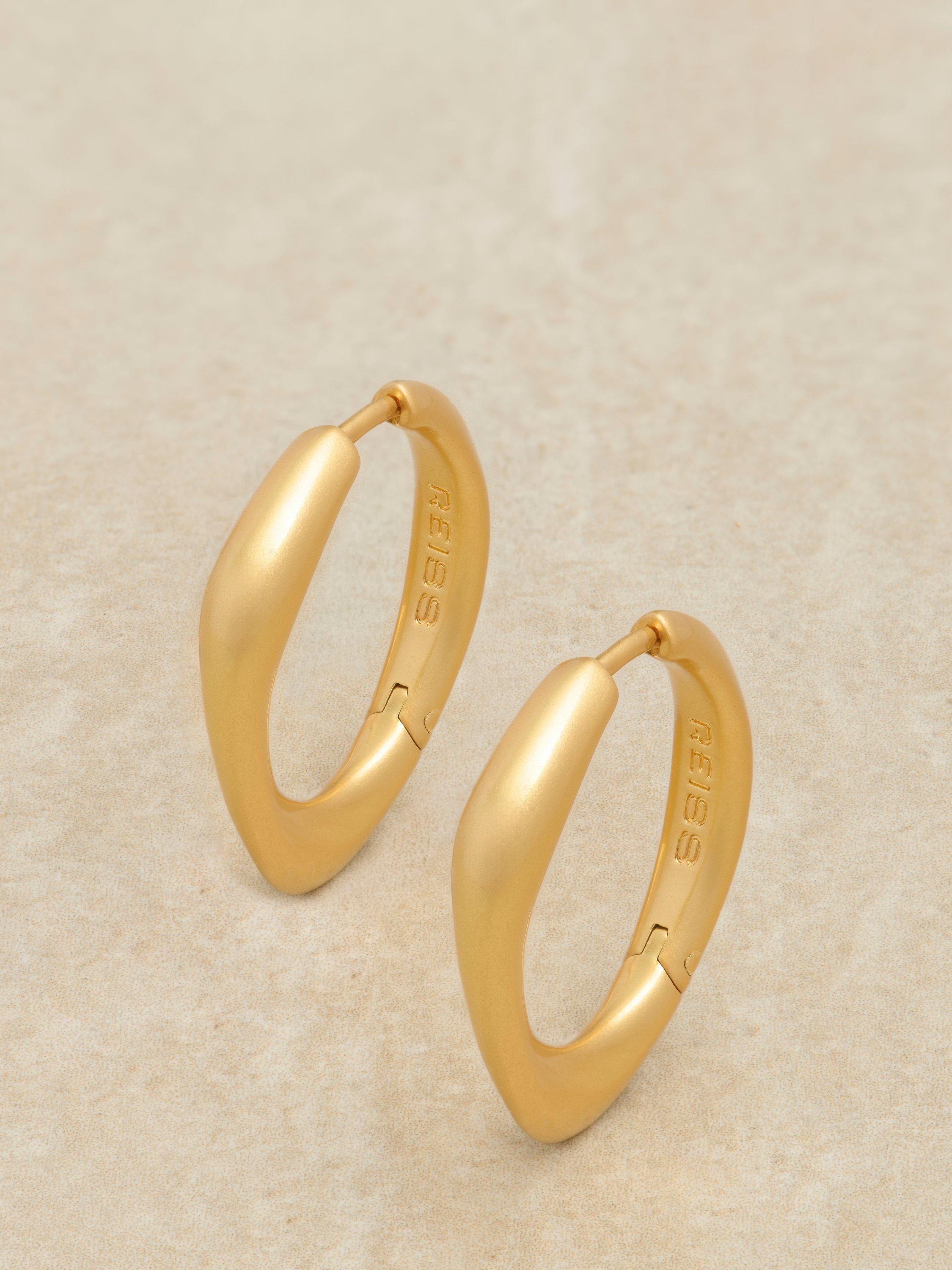 Product image 4 of 5, which shows Reiss Sofia Smooth Curve Hoop Earrings, Gold