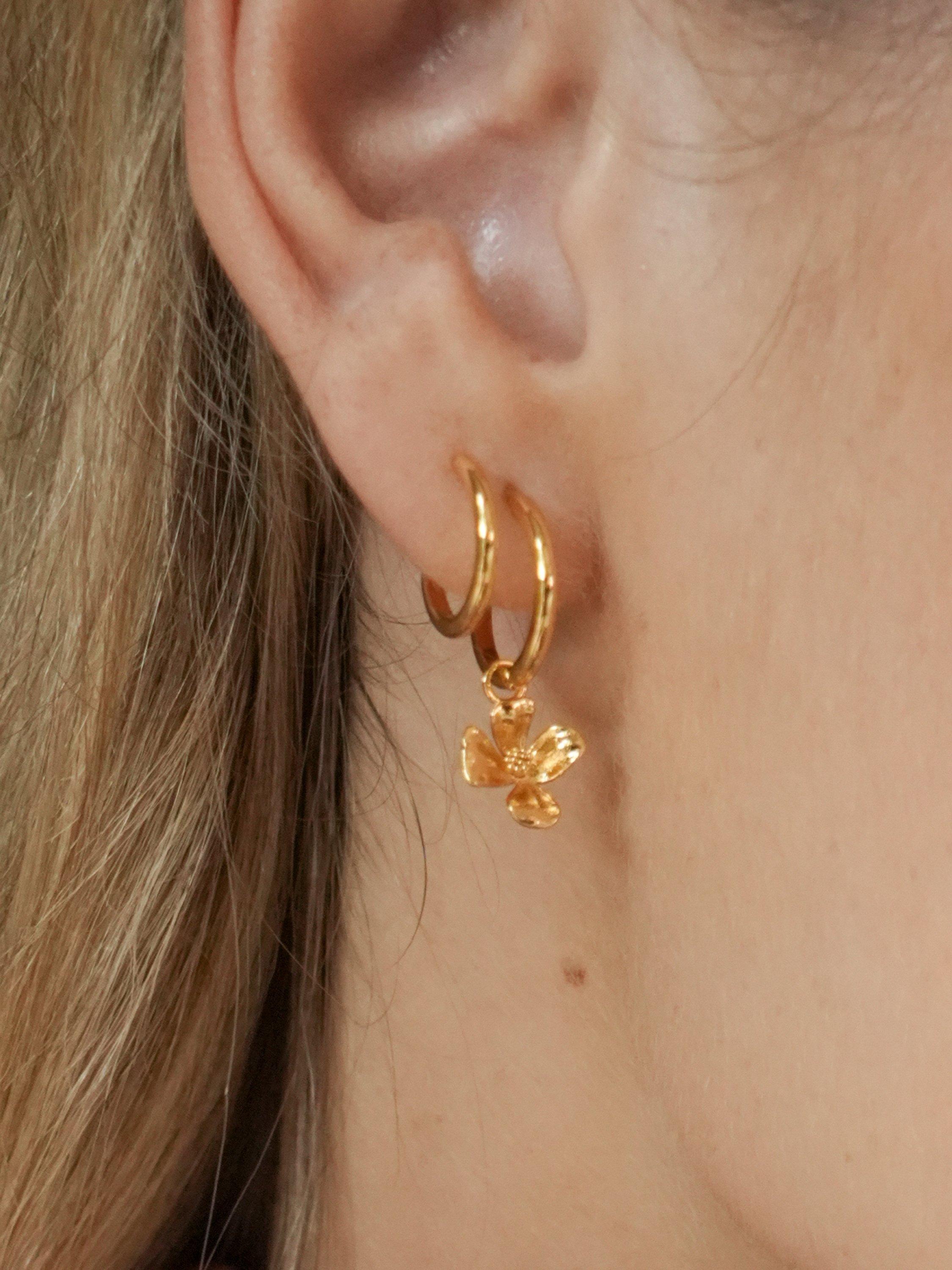 Product image 2 of 3, which shows Estella Bartlett THE EDIT Waterproof Flower Illusion Hoop Earring, Gold