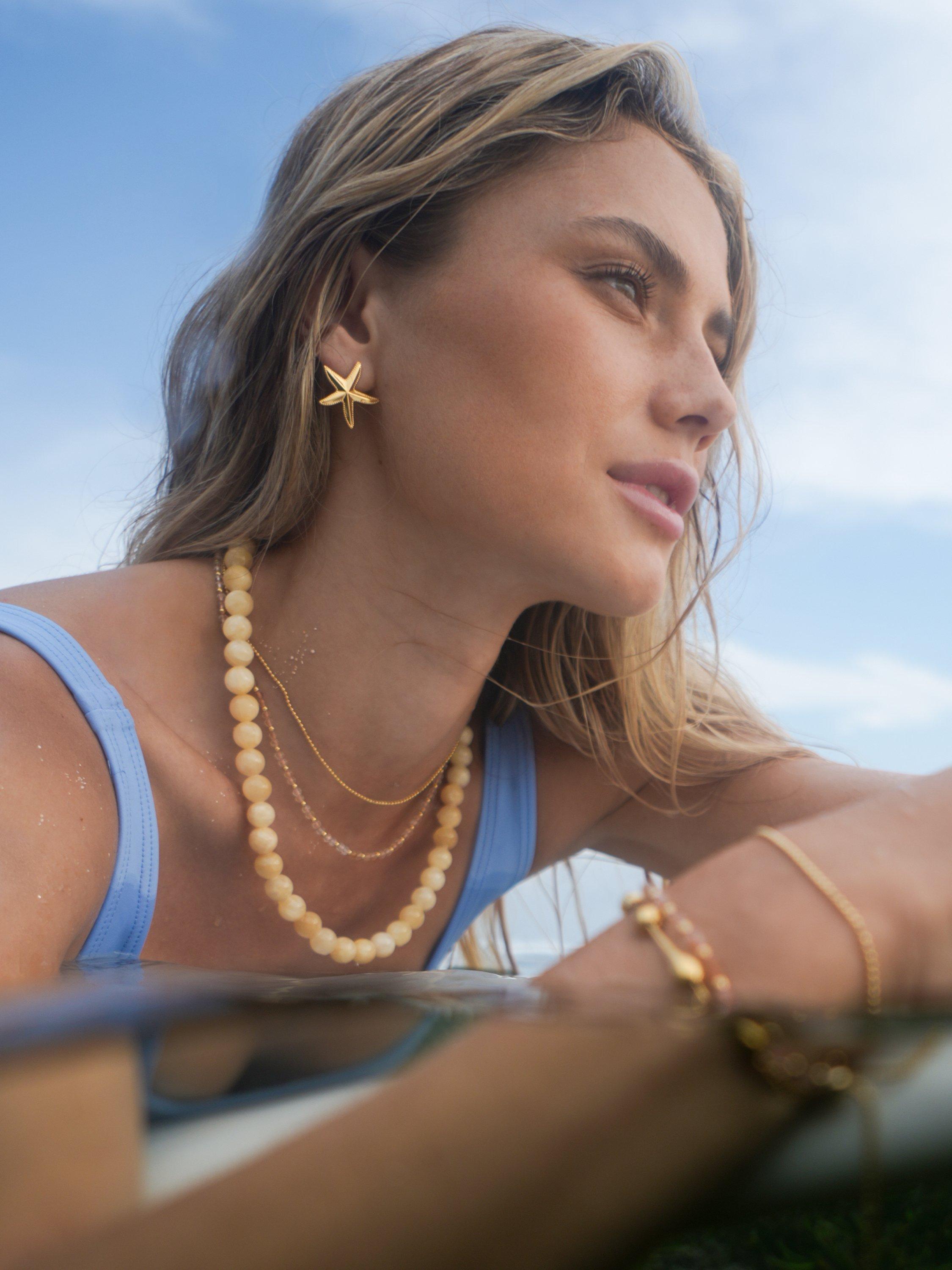 Product image 2 of 3, which shows Estella Bartlett THE EDIT Waterproof Oversized Starfish Stud Earrings, Gold