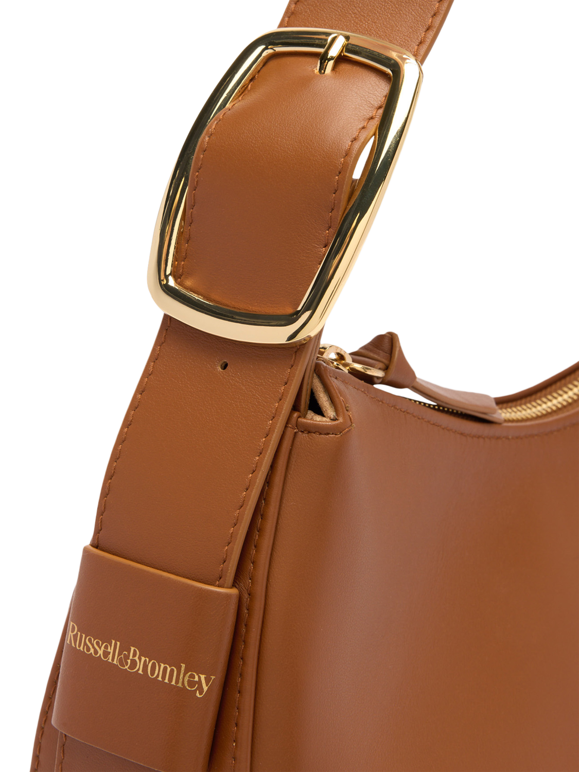 Product image 3 of 4, which shows Russell & Bromley Sutton Leather Medium Oval Shoulder Bag, Brown