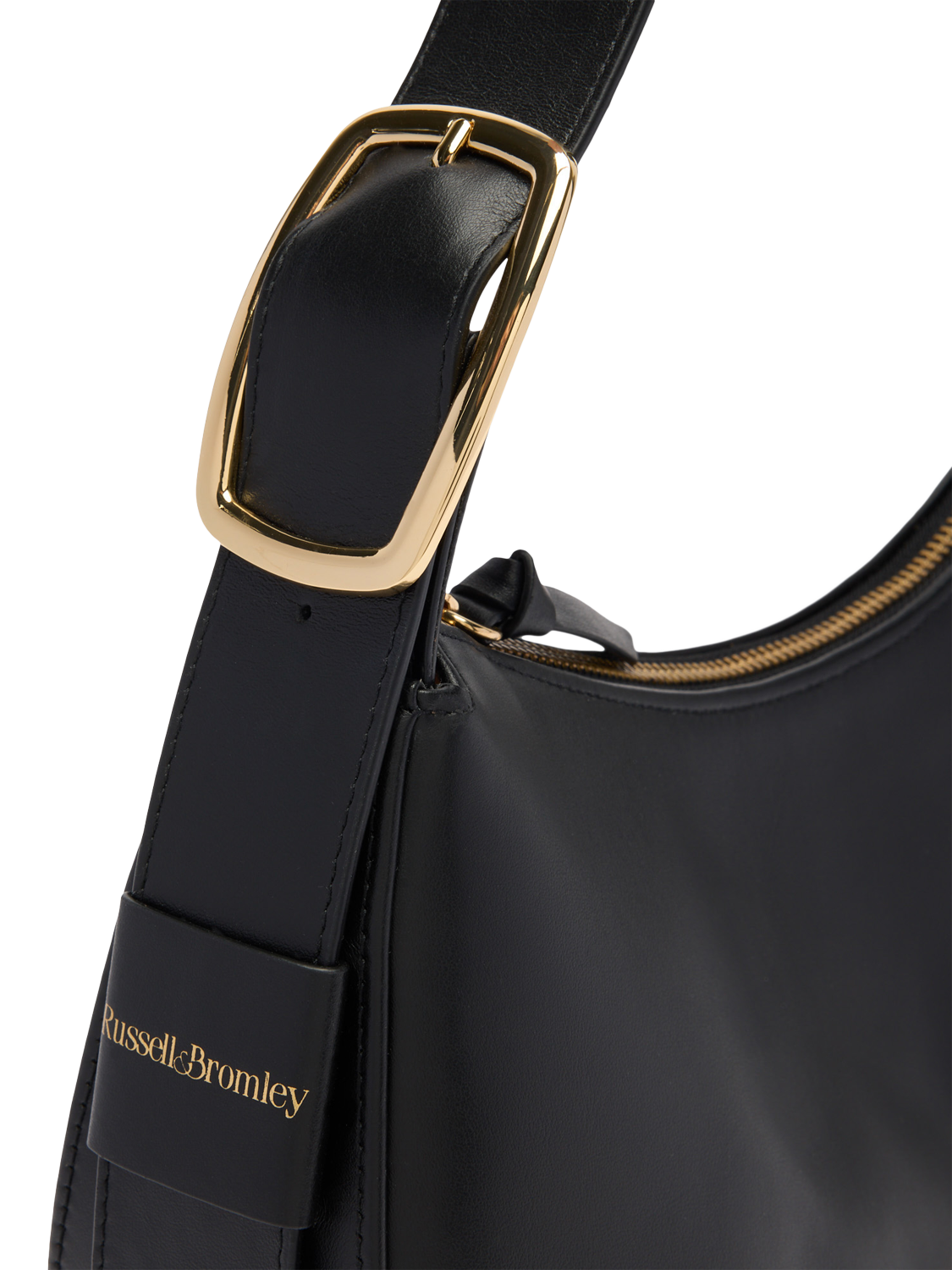 Product image 3 of 4, which shows Russell & Bromley Sutton Leather Medium Oval Shoulder Bag, Black