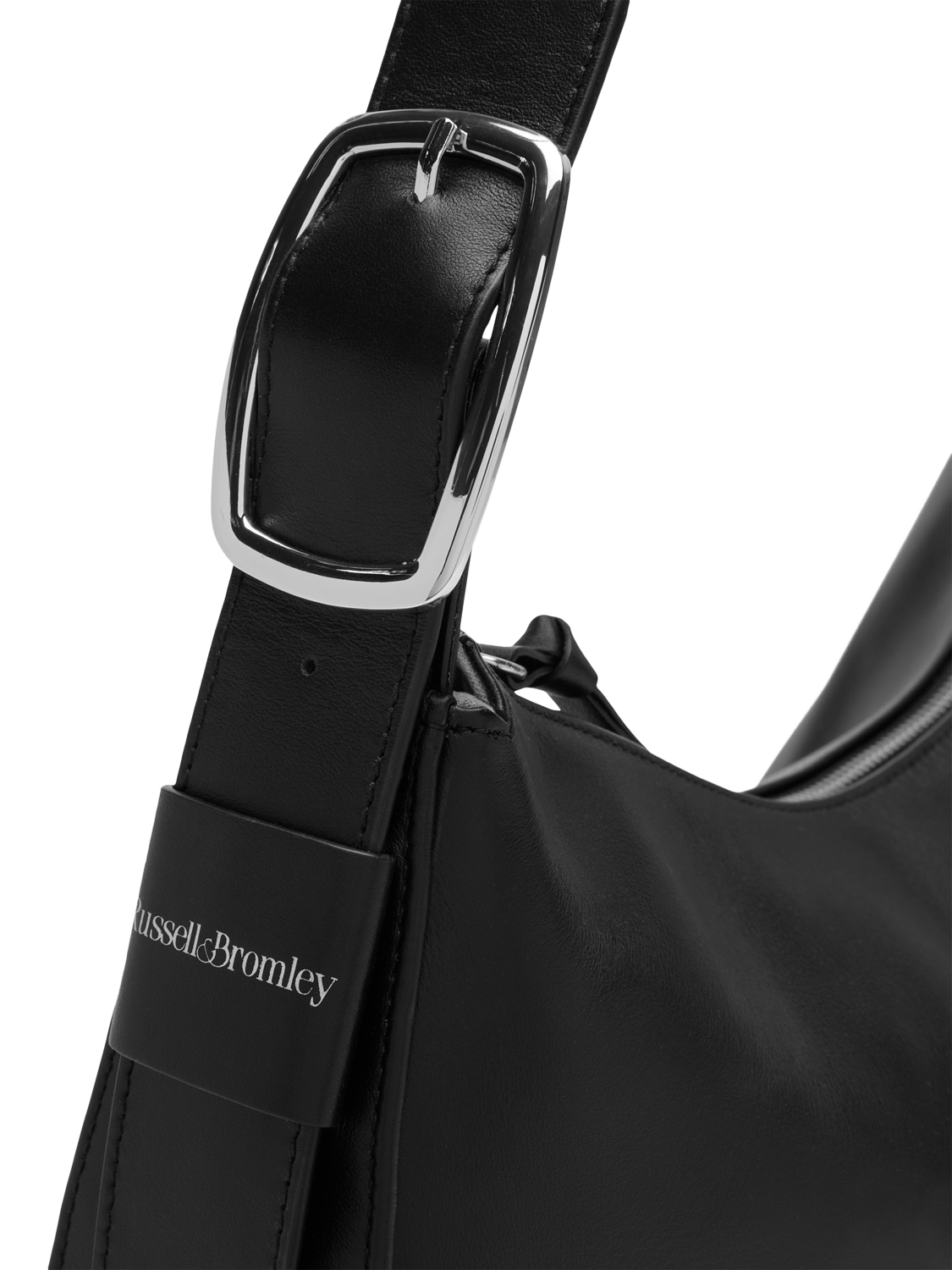 Product image 3 of 4, which shows Russell & Bromley Sutton Leather Large Oval Shoulder Bag, Black