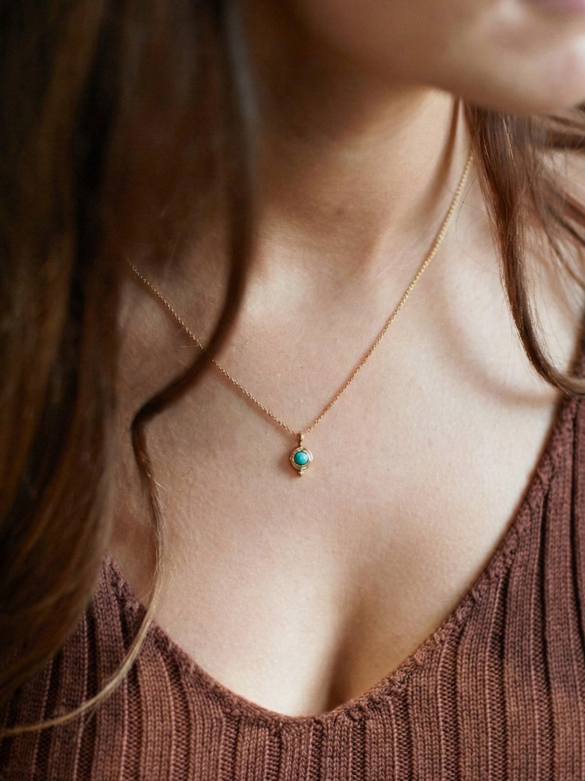 Product image 2 of 3, which shows Ottoman Hands December Birthstone Necklace